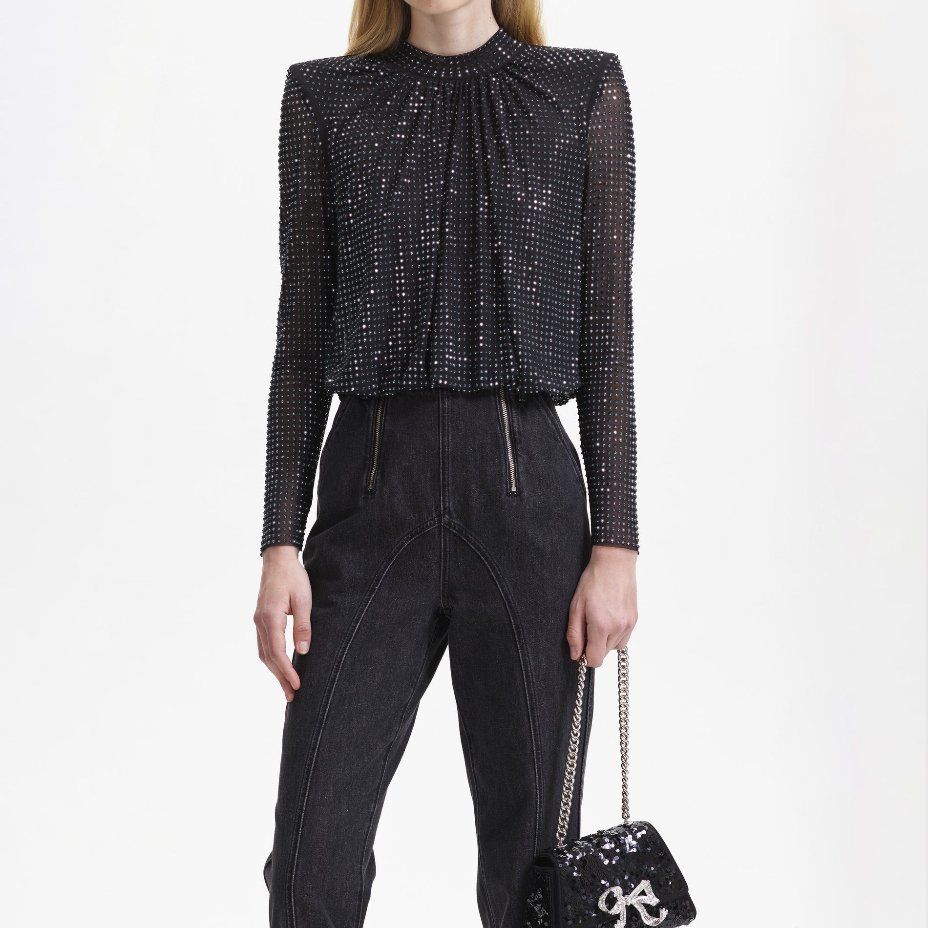 A close up of the fabric for the Black Rhinestone Mesh Top