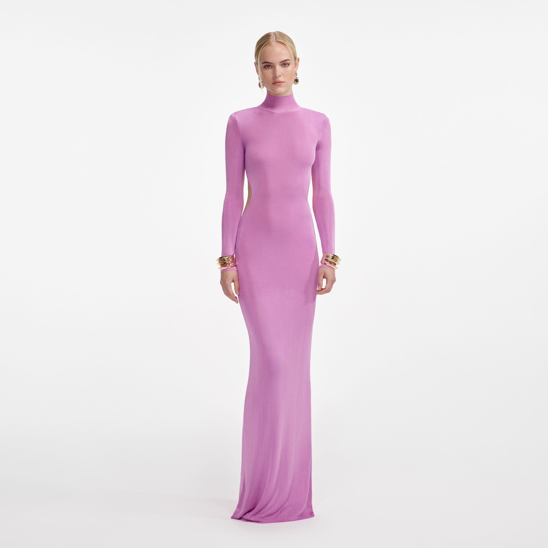 Front view of a woman wearing the Pink Viscose Knit Maxi Dress