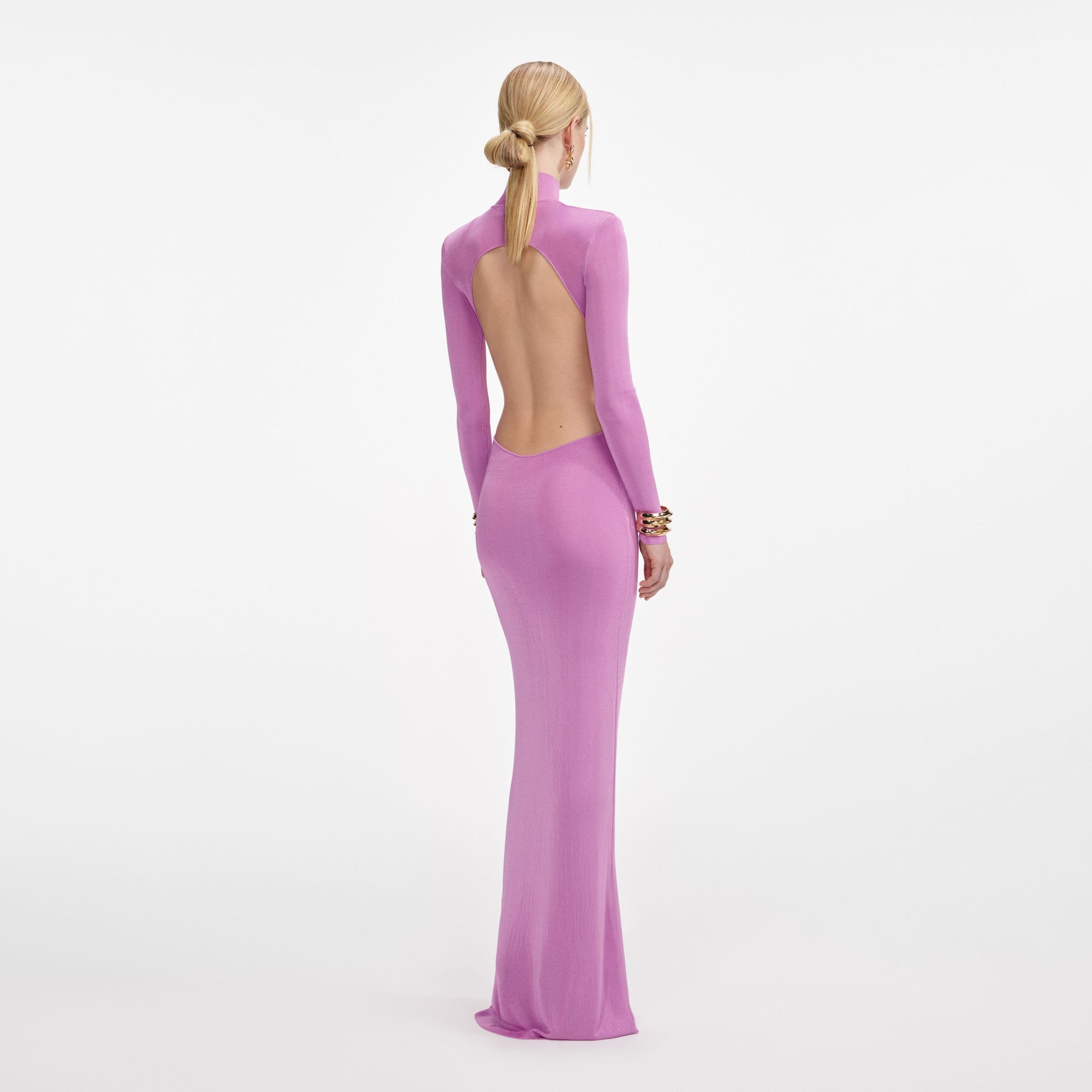 Back view of a woman wearing the Pink Viscose Knit Maxi Dress