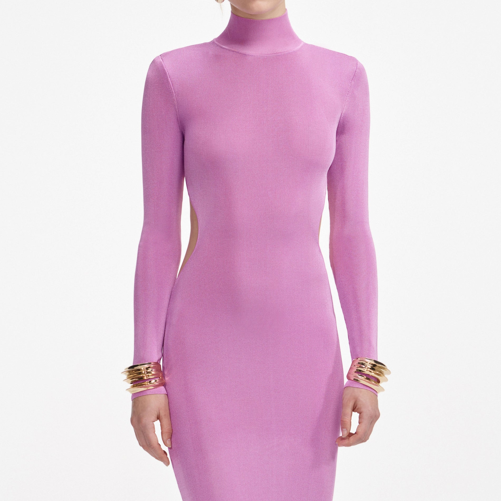 A close up of a woman wearing the Navy Pointelle Knit Trousers