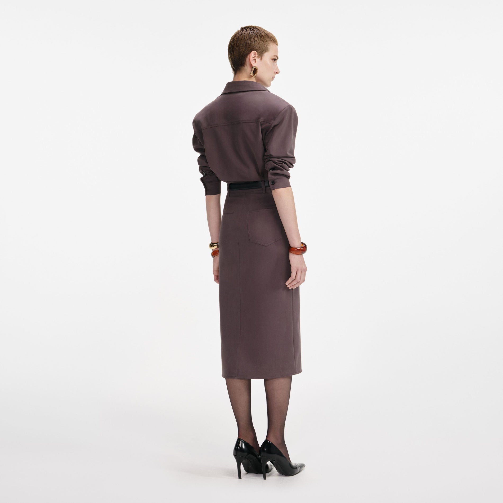 Back view of a woman wearing the Brown Cotton Belted Midi Dress