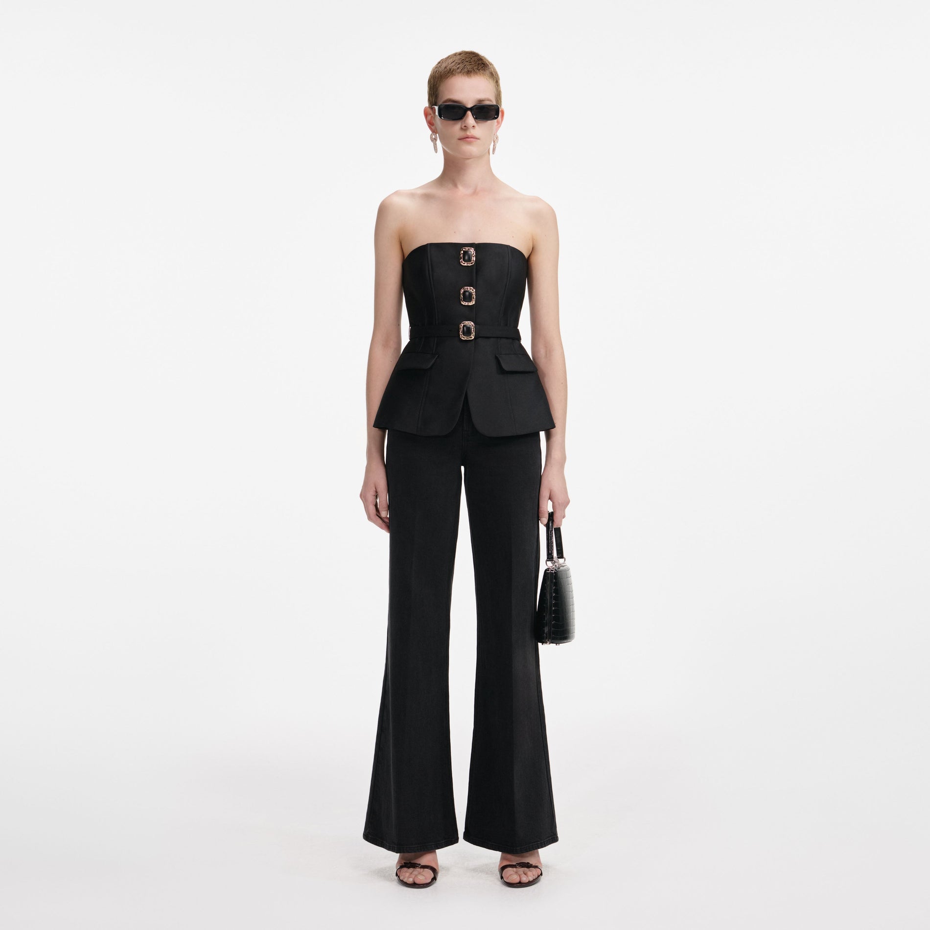 Front view of a woman wearing the Black Taffeta Bandeau Jumpsuit