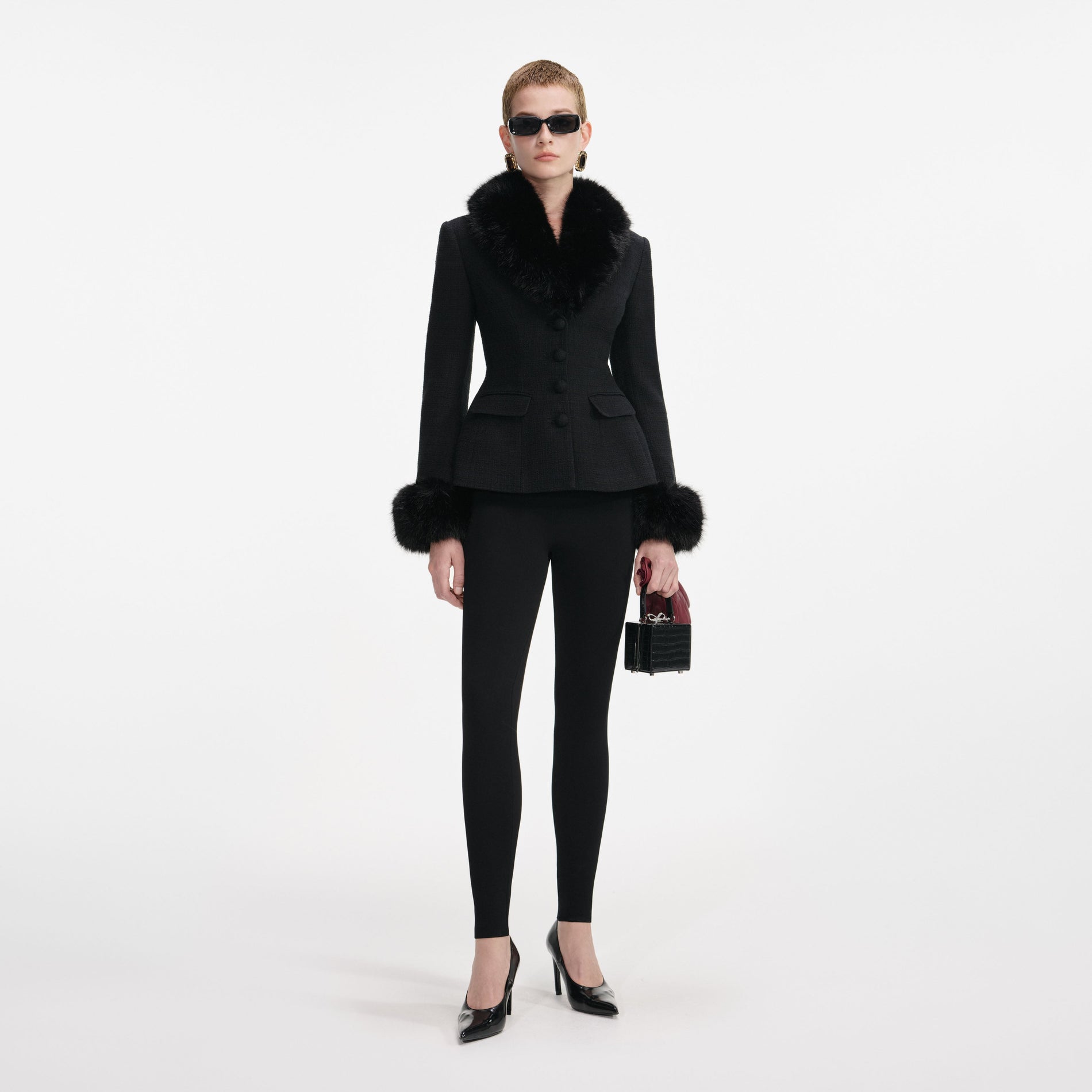 Front view of a woman wearing the Black Tailored Boucle Fur Jacket