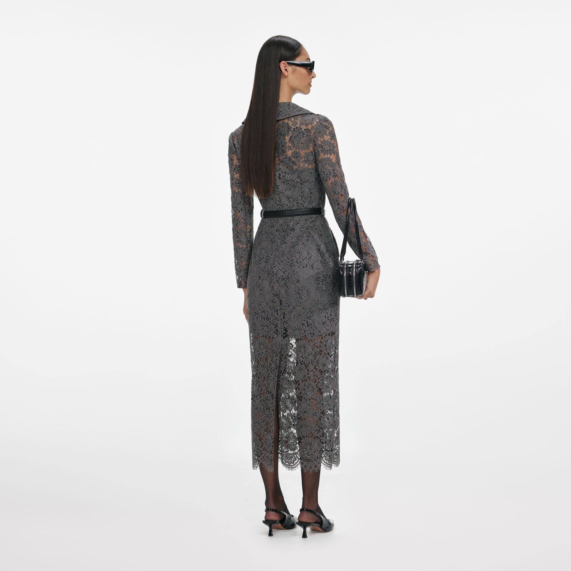 Back view of a woman wearing the Grey Floral Lace Midi Dress