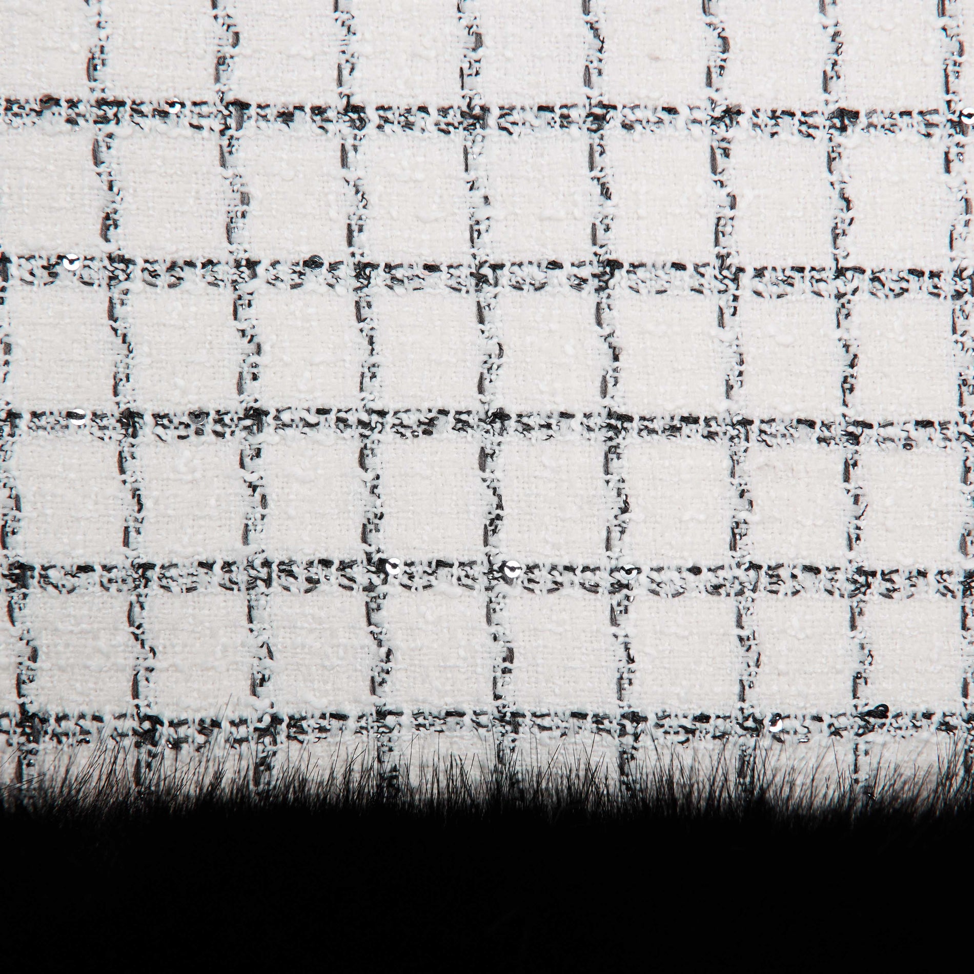 A close up of the fabric for the Check Boucle Fur Hem Mini Skirt