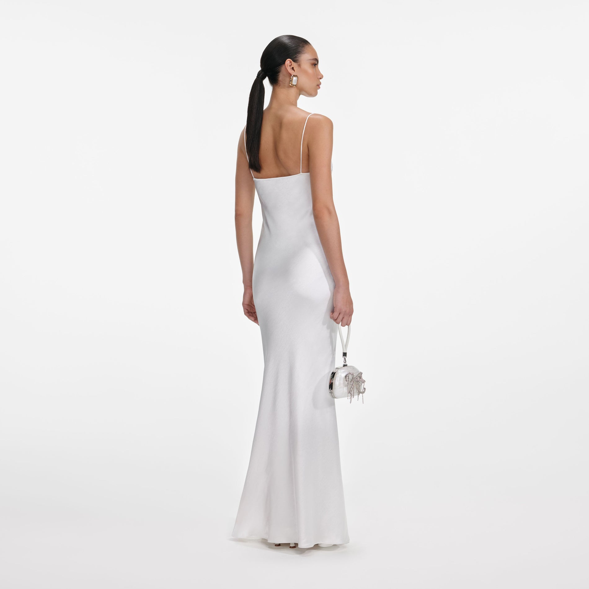 Back view of a woman wearing the White Satin Lace Maxi Dress