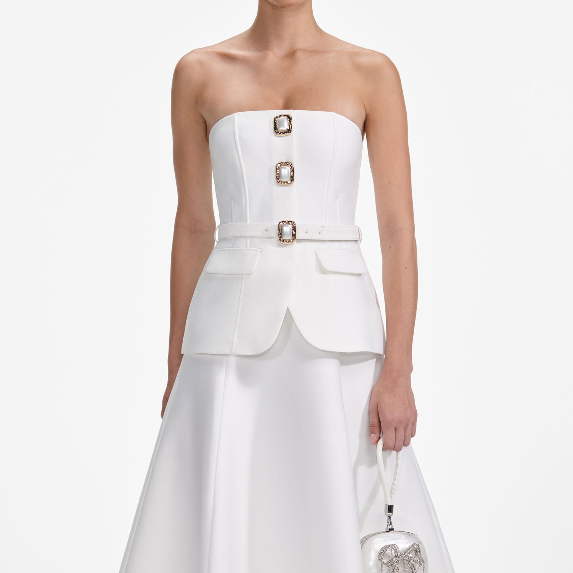 A close up of a woman wearing the White Taffeta Bandeau Midi Dress