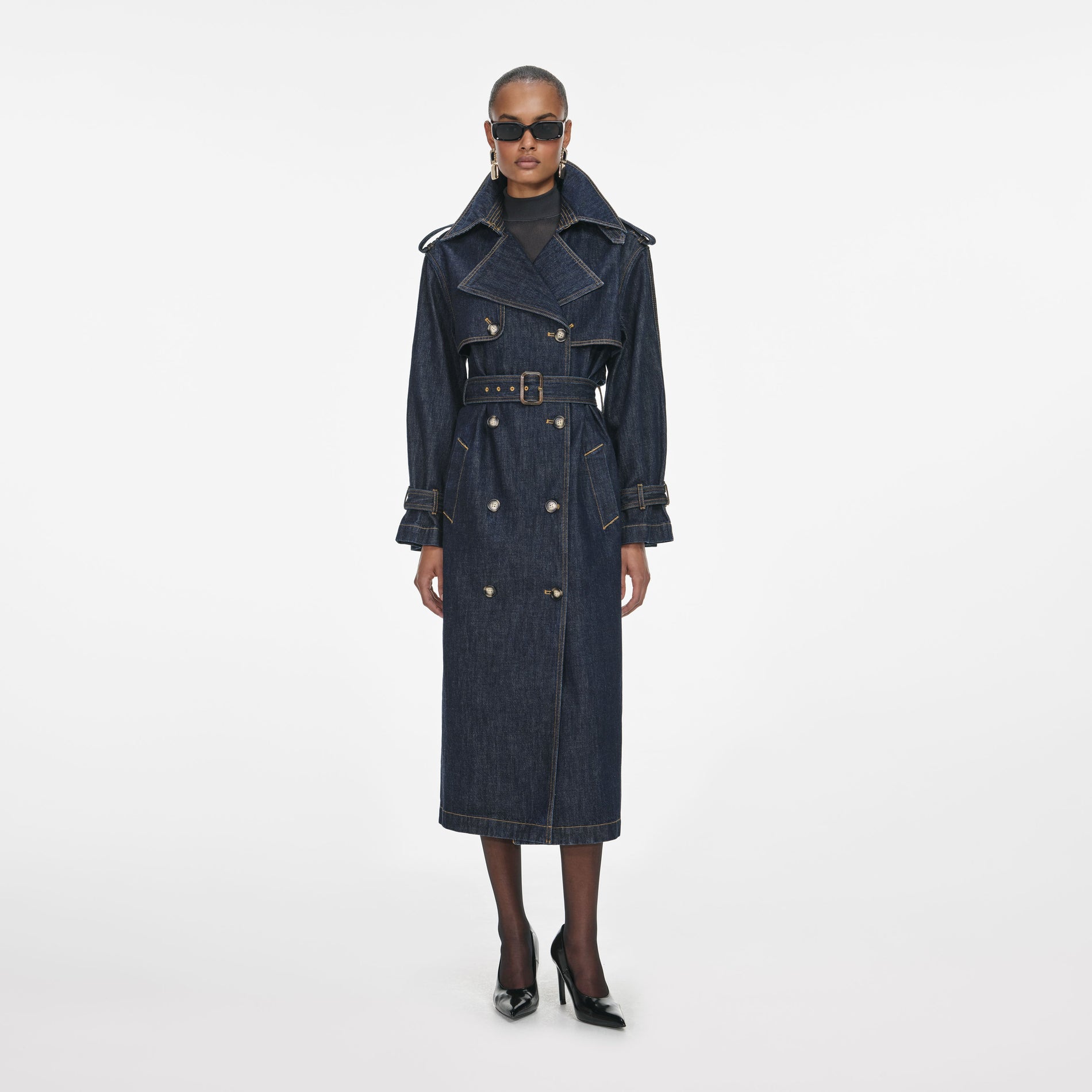 Front view of a woman wearing the Indigo Denim Trench Coat