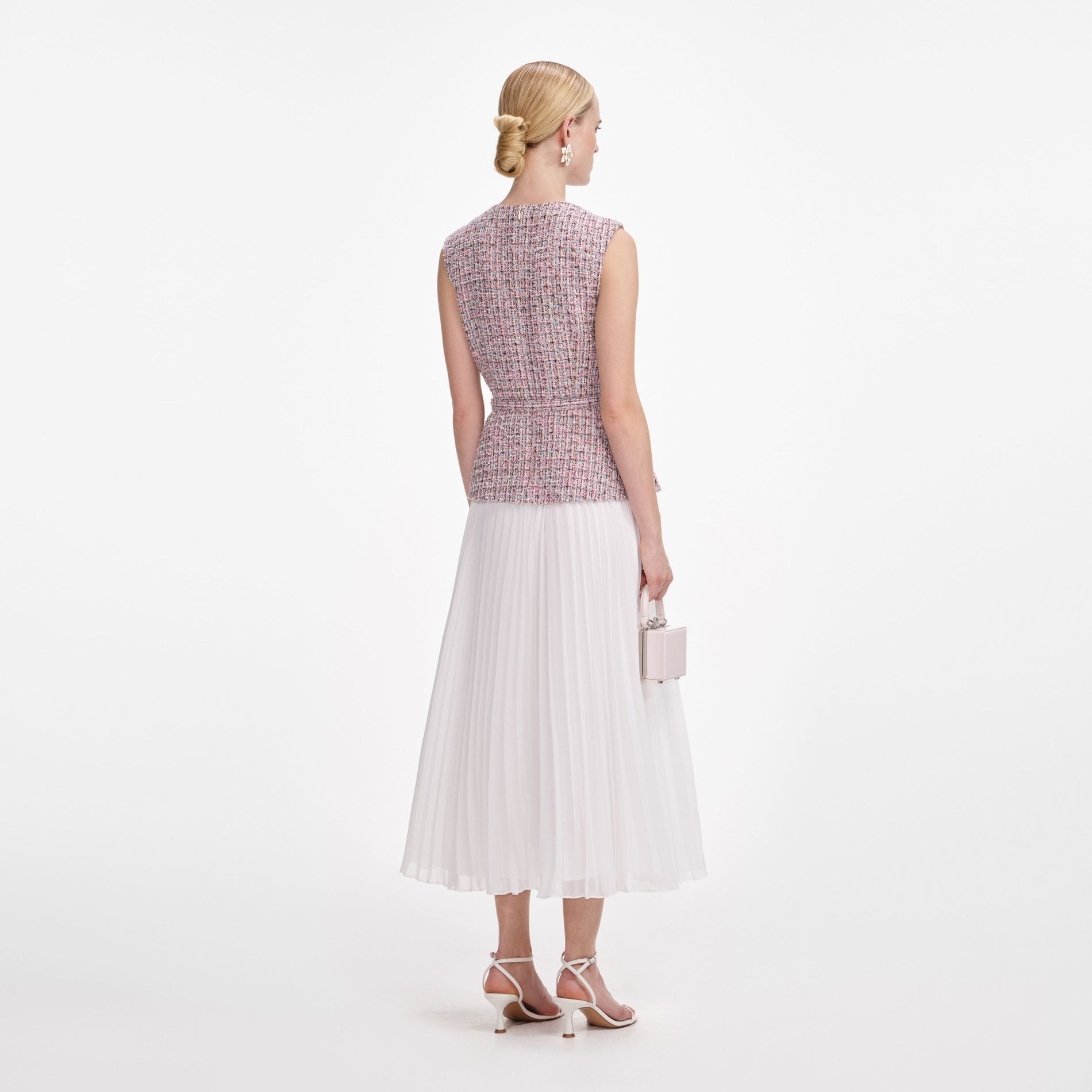 Back view of a woman wearing the Pink Boucle Chiffon Midi Dress