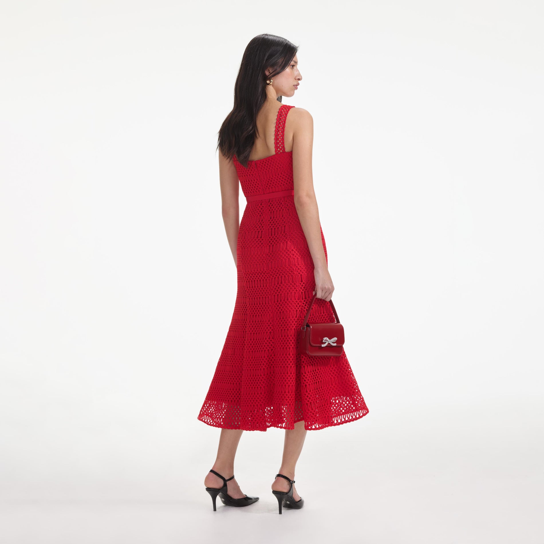 Back view of a woman wearing the Red Lattice Lace Midi Dress