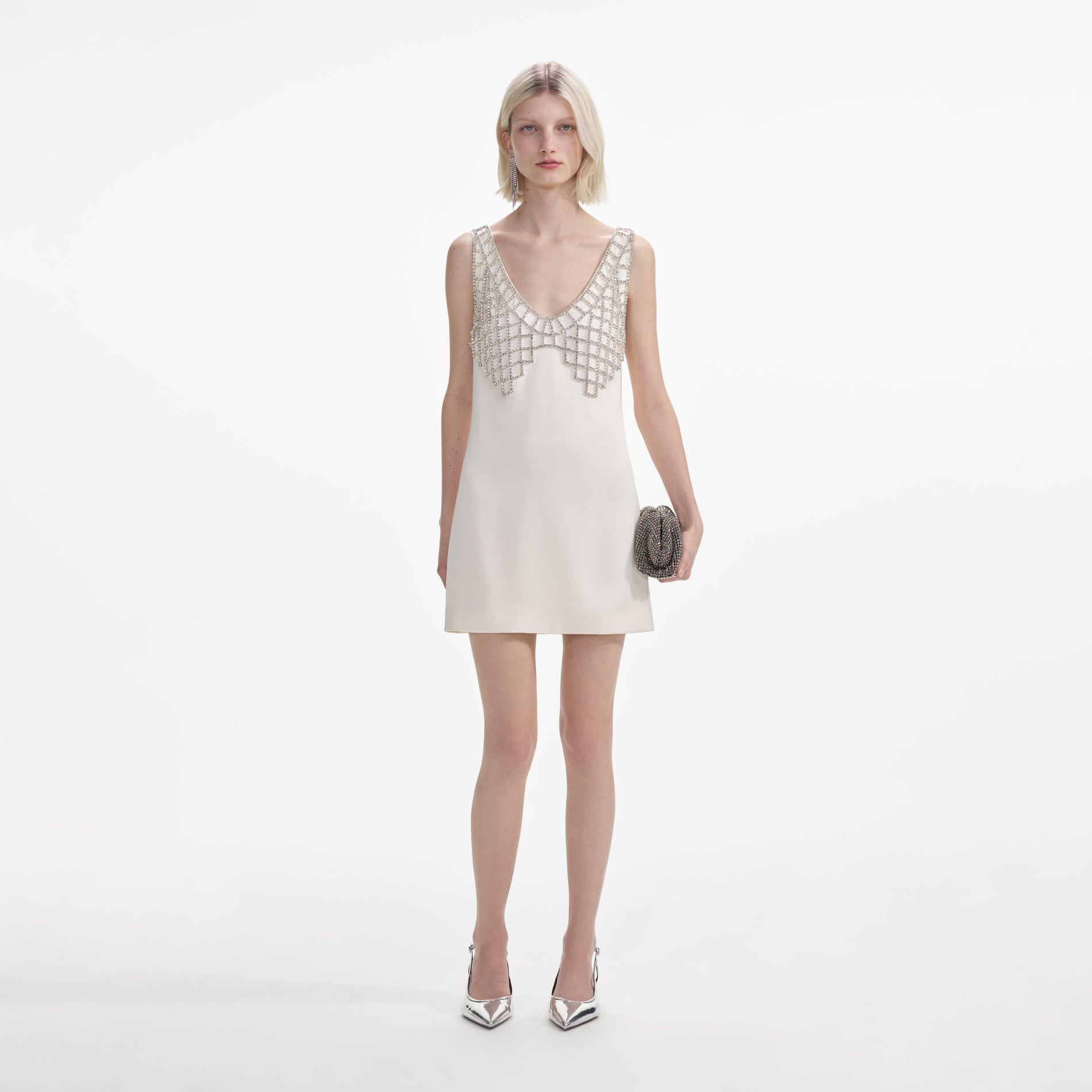 Front view of a woman wearing the Cream Satin Diamante Bralette Mini Dress