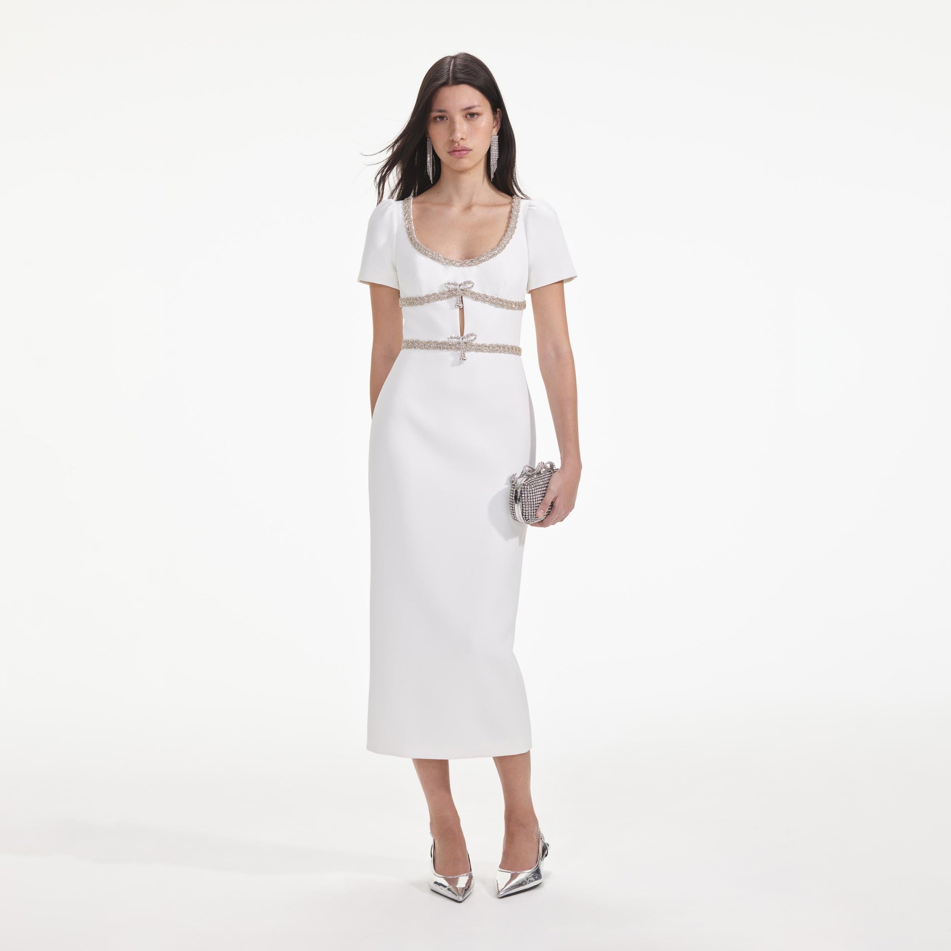 Front view of a woman wearing the White Diamante Bow Trim Midi Dress