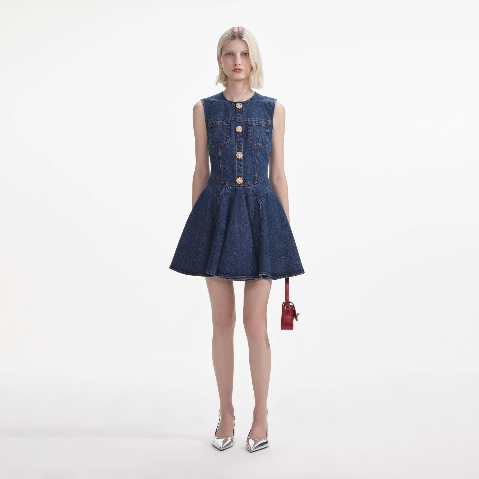 Front view of a woman wearing the Denim Skater Mini Dress
