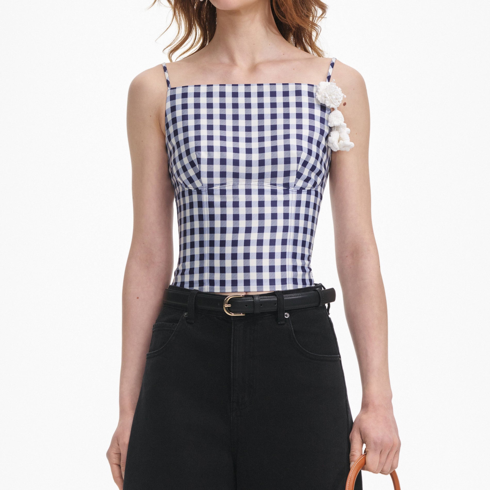 A close up of a woman wearing the Navy Gingham Taffeta Top