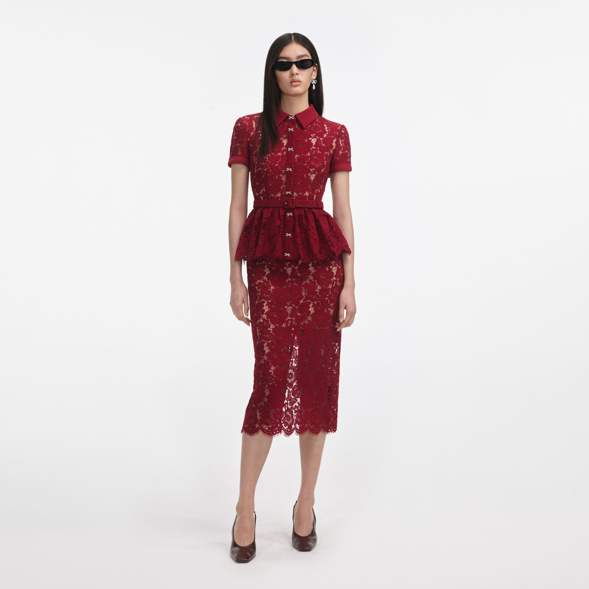 Front view of a woman wearing the Burgundy Lace Peplum Midi Dress