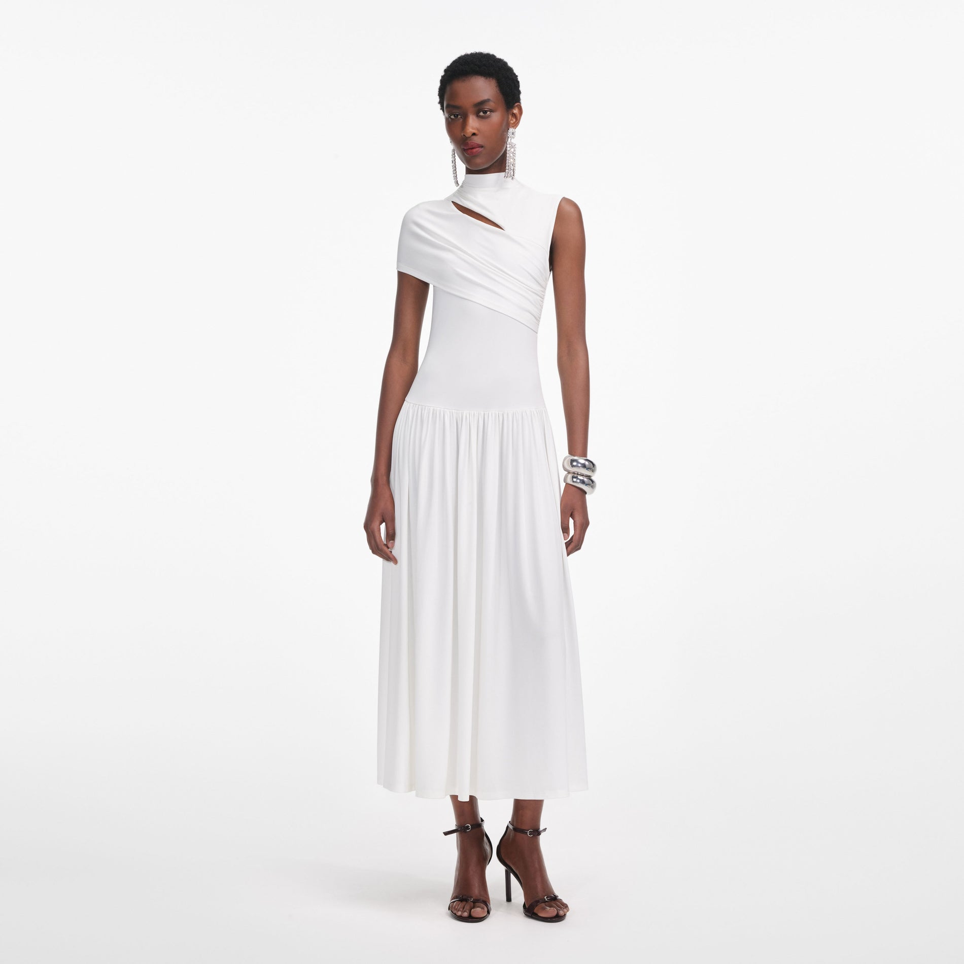 Front view of a woman wearing the White Jersey Cut Out Midi Dress