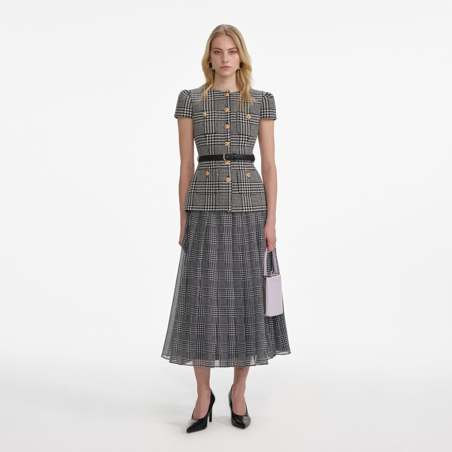 Front view of a woman wearing the Houndstooth Tailored Midi Dress