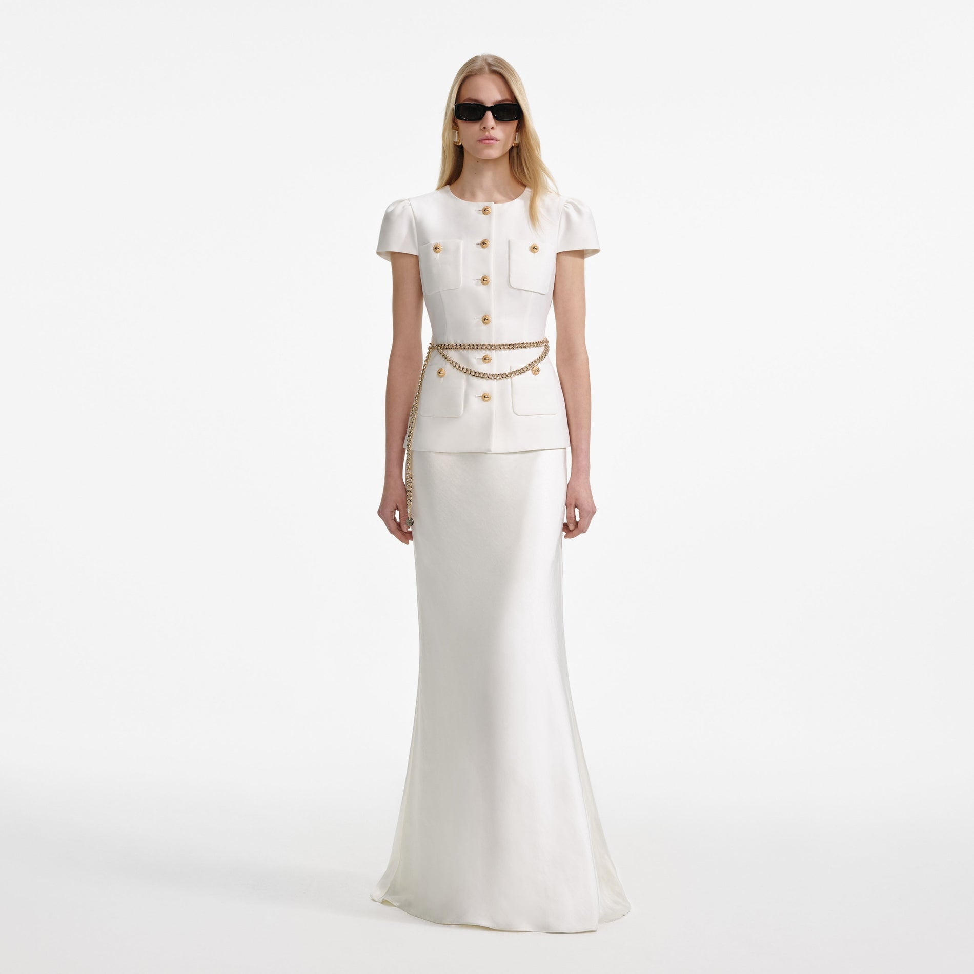 Front view of a woman wearing the Cream Taffeta Chain Belt Maxi Dress