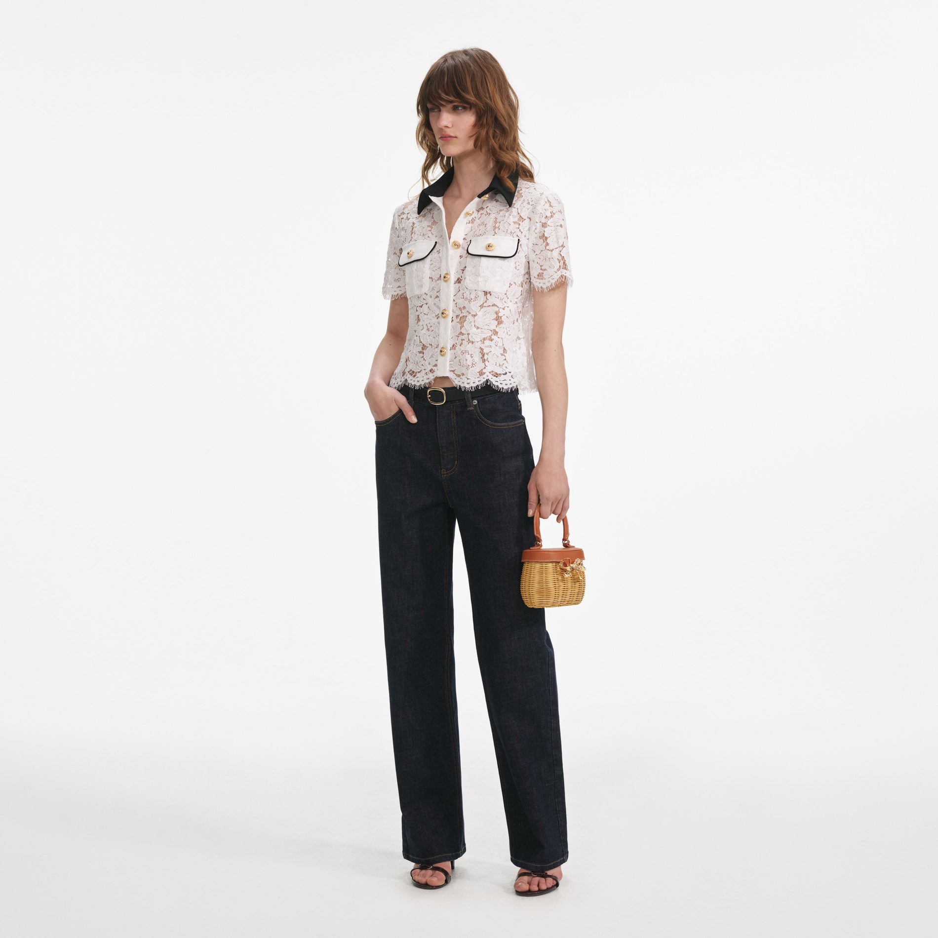 Side view of a woman wearing the White Lace Contrast Collar Top