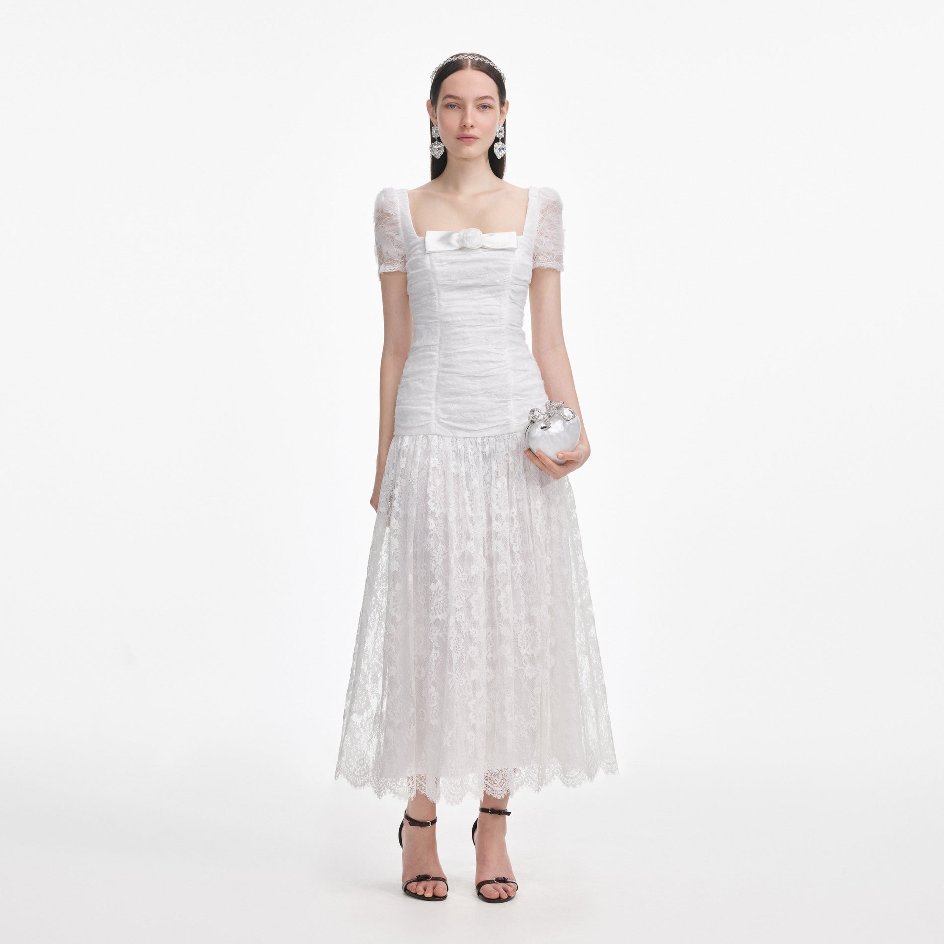Front view of a woman wearing the White Tulle Lace Gathered Midi Dress
