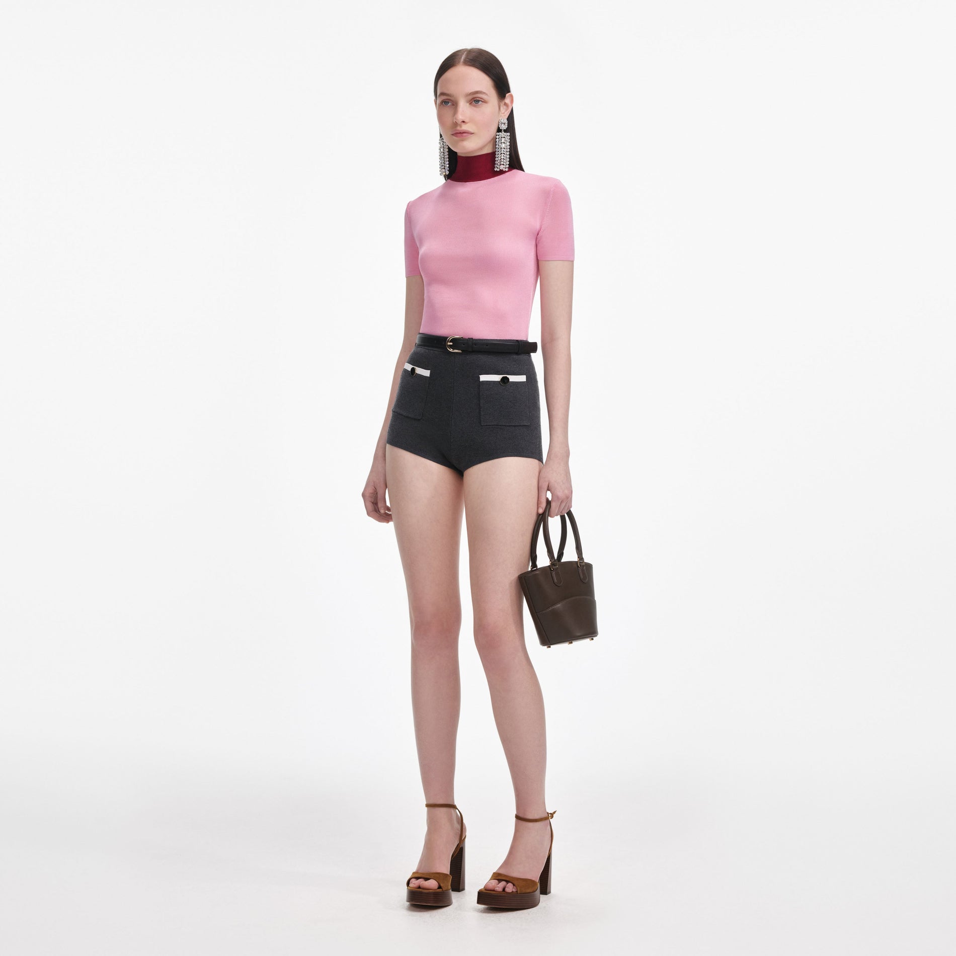 Side view of a woman wearing the Grey Knit Shorts