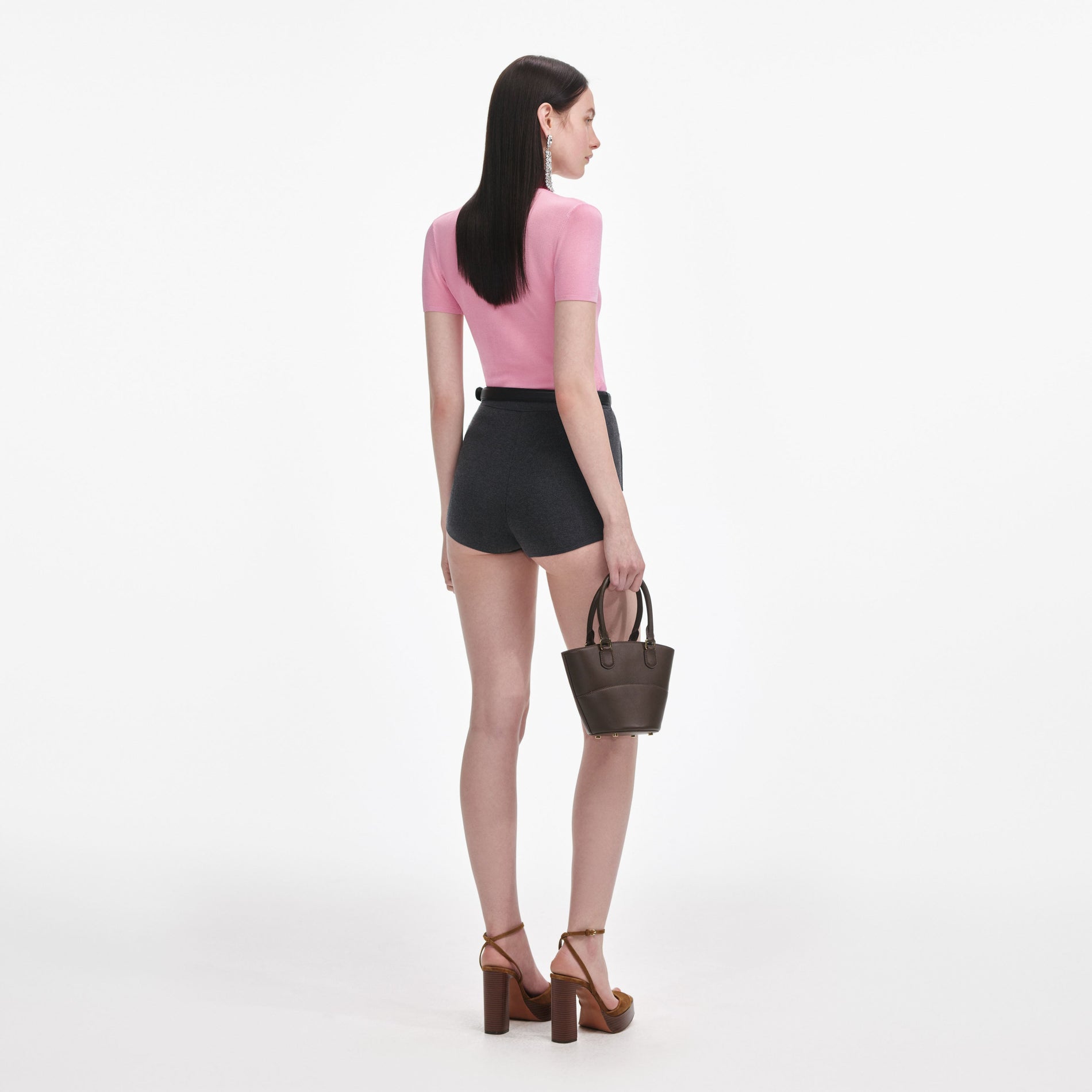 Back view of a woman wearing the Grey Knit Shorts