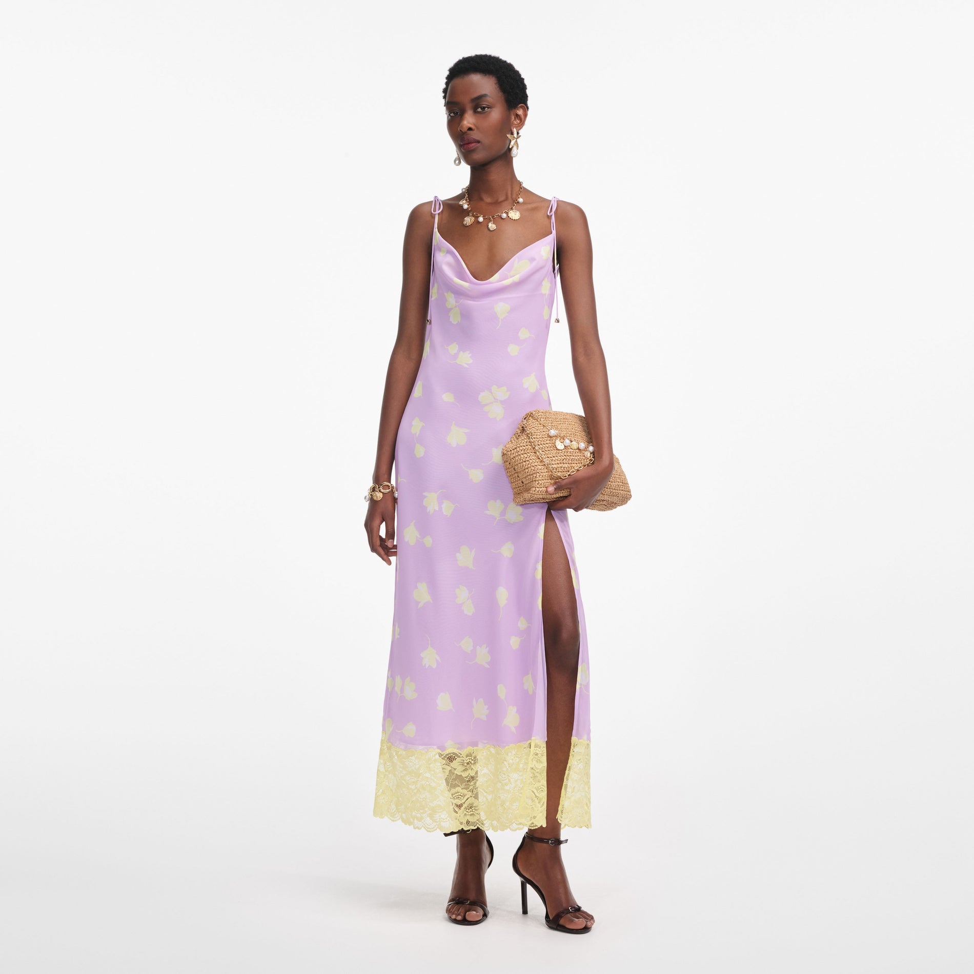 Front view of a woman wearing the Lilac Floral Chiffon Midi Dress