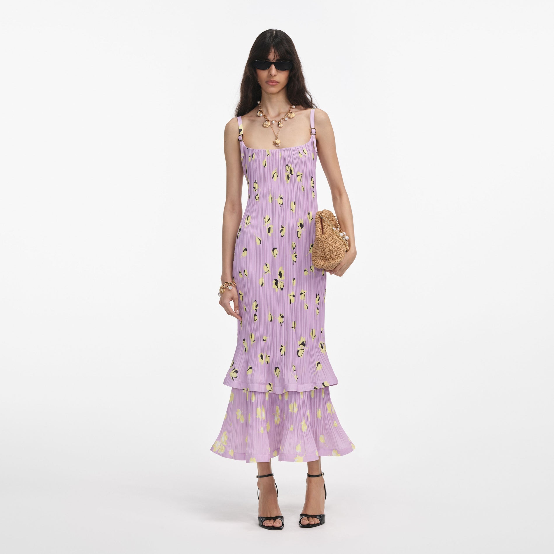 Front view of a woman wearing the Lilac Floral Plisse Midi Dress
