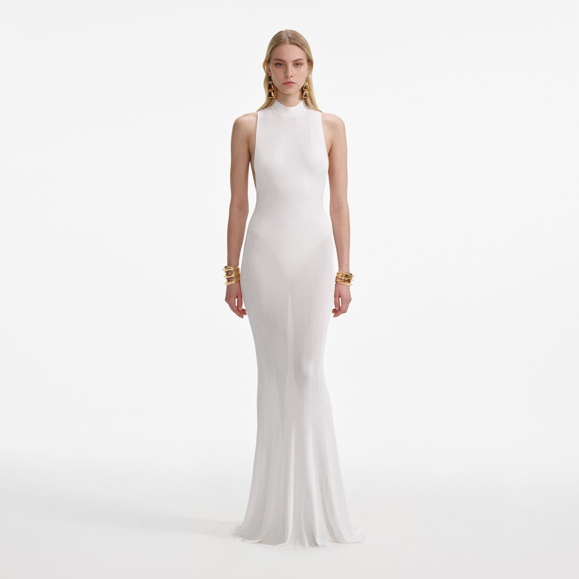 Front view of a woman wearing the White Racer Back Viscose Knit Maxi Dress
