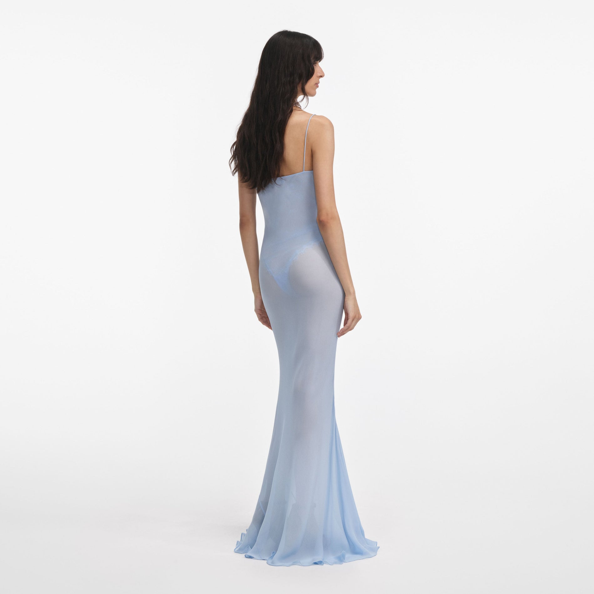Back view of a woman wearing the Blue Strappy Georgette Maxi Dress