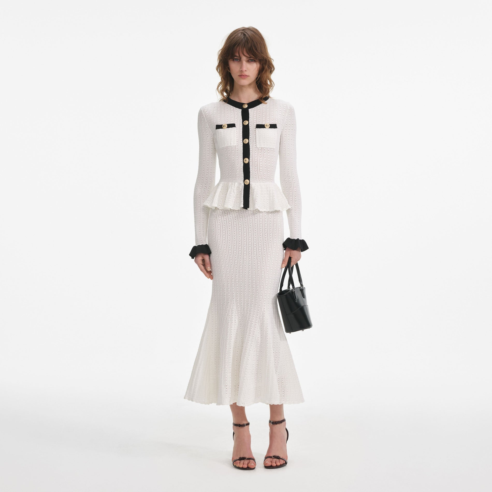 Front view of a woman wearing the White Pointelle Knit Contrast Midi Dress