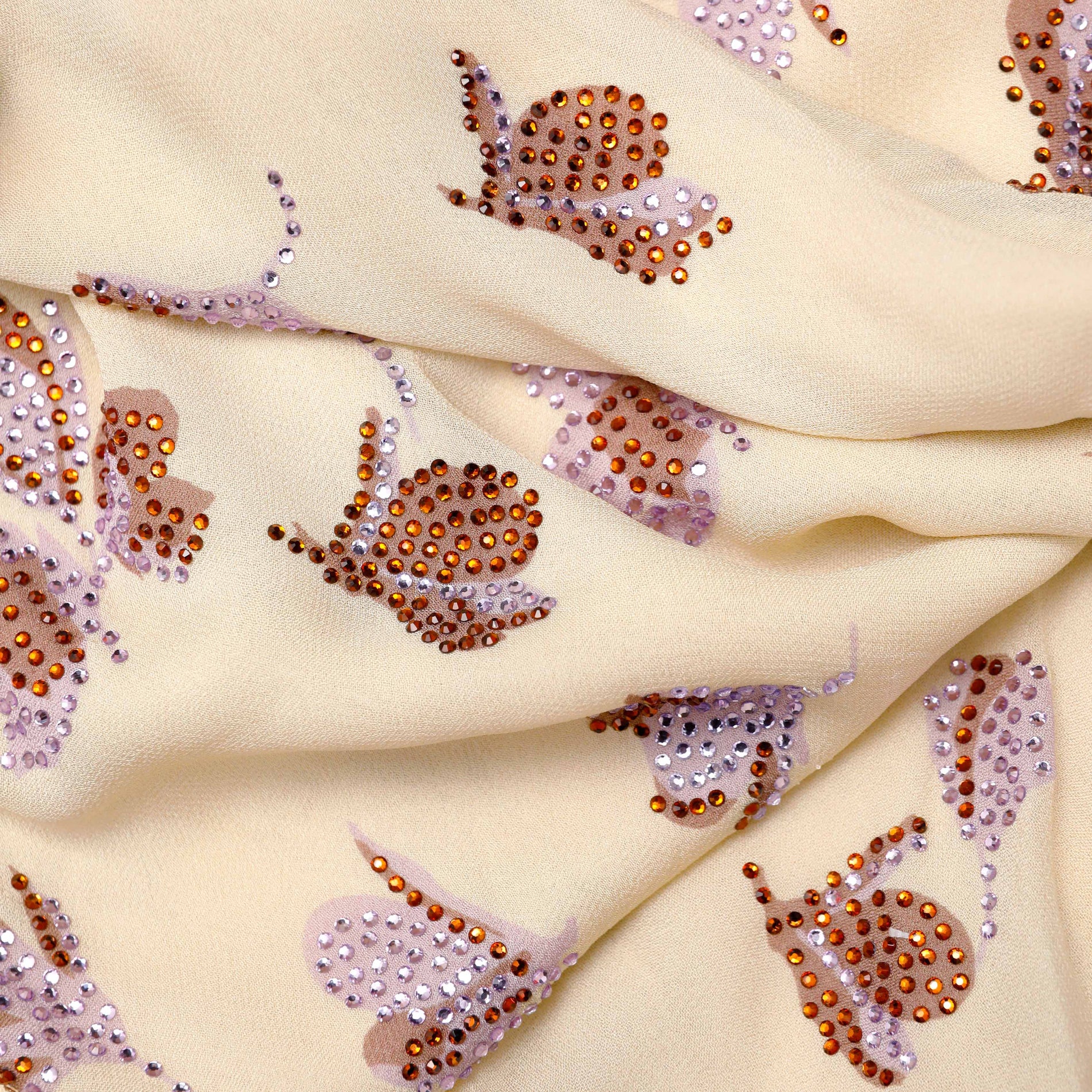 A close up of the fabric for the Yellow Floral Rhinestone Maxi Dress