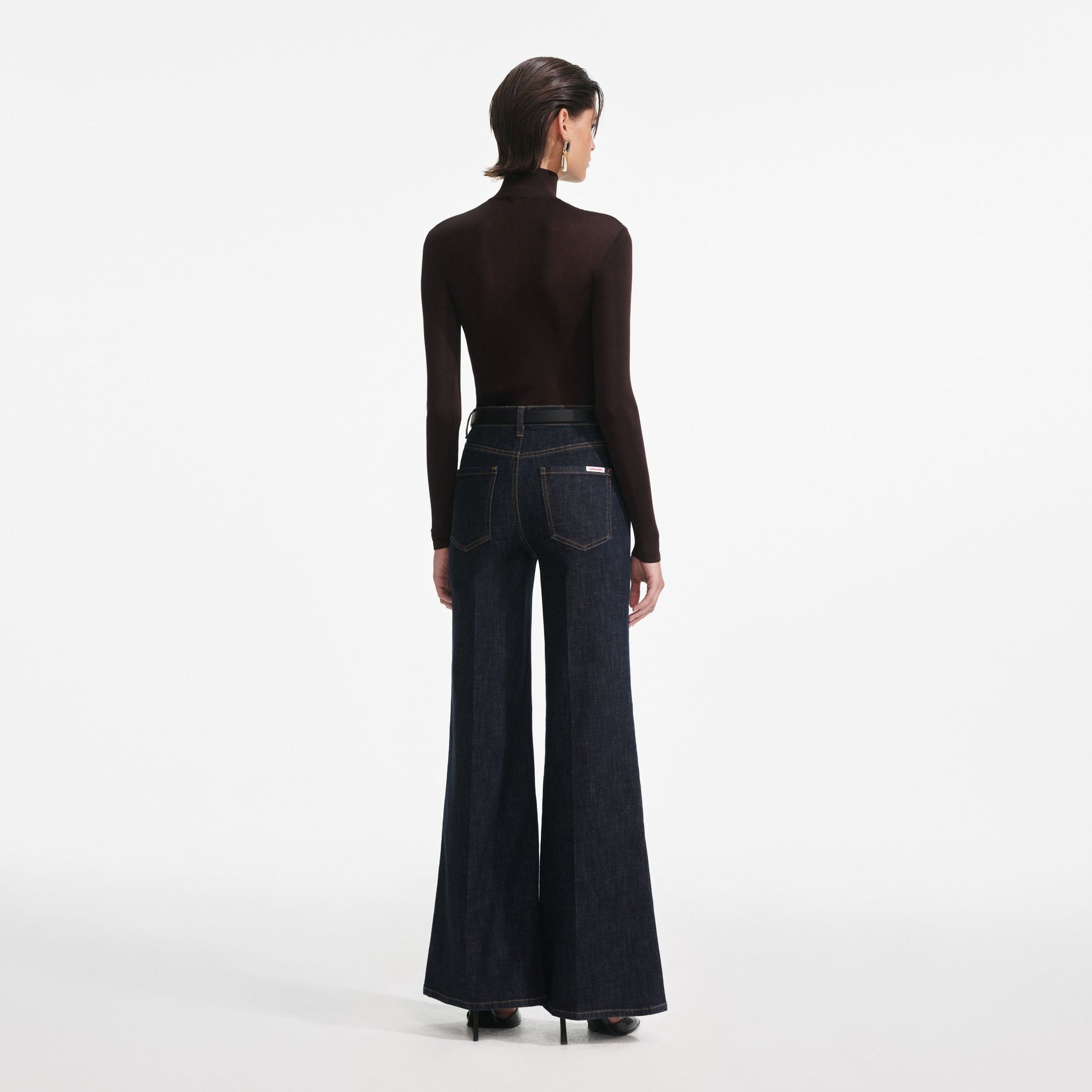 Back view of a woman wearing the Brown Viscose Knit Top
