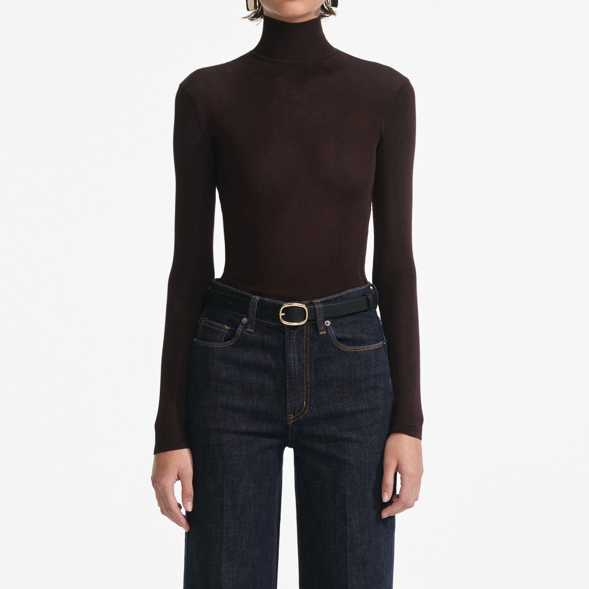 A close up of a woman wearing the Brown Viscose Knit Top