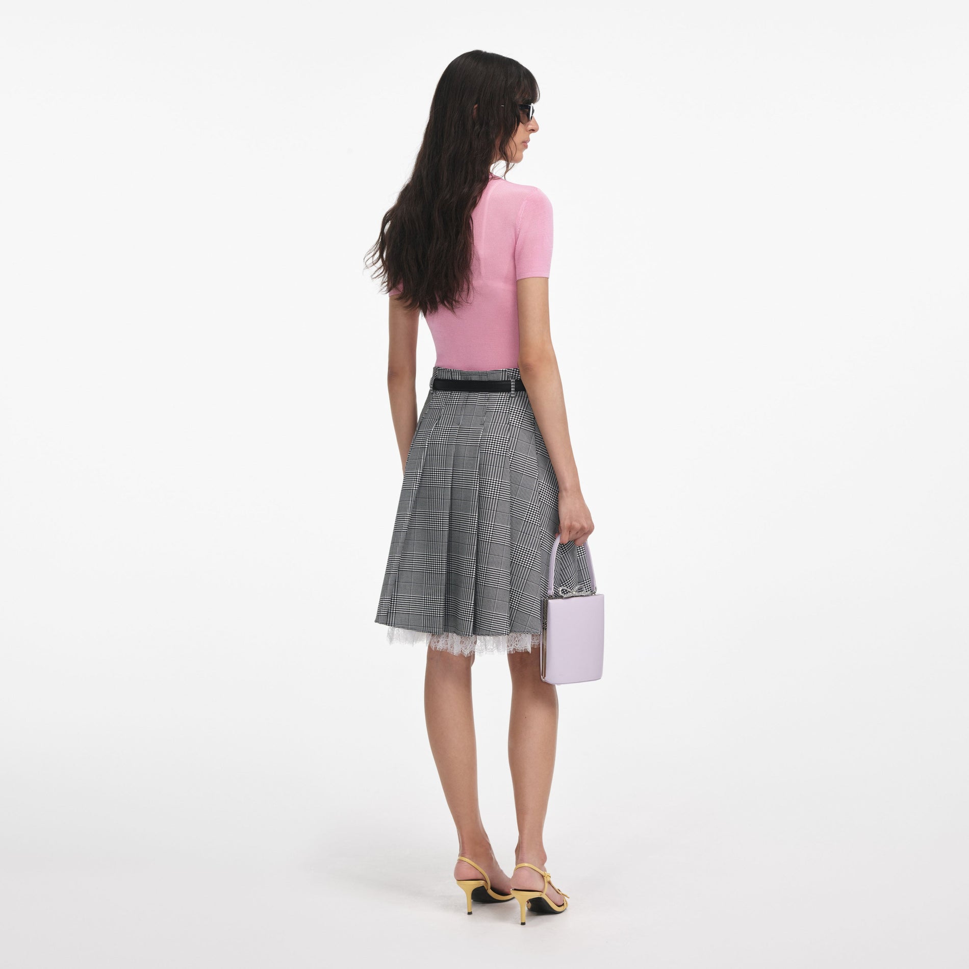 Back view of a woman wearing the Pink Viscose Knit Short Sleeve Top