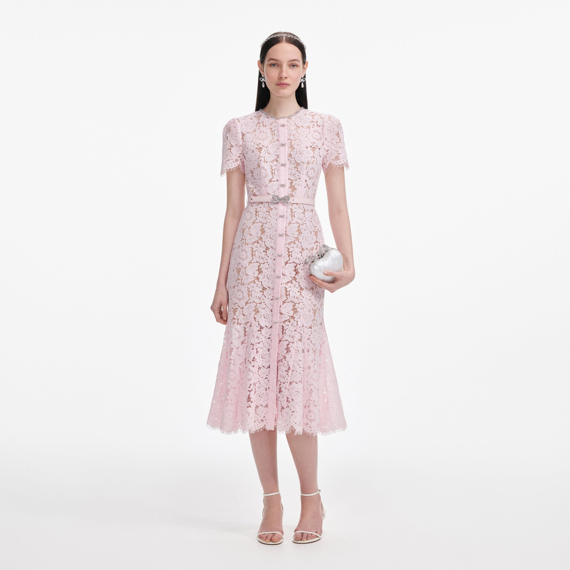 Front view of a woman wearing the Pink Lace Bow Trim Midi Dress