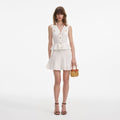 White Pointelle Peplum Knit Mini Dress