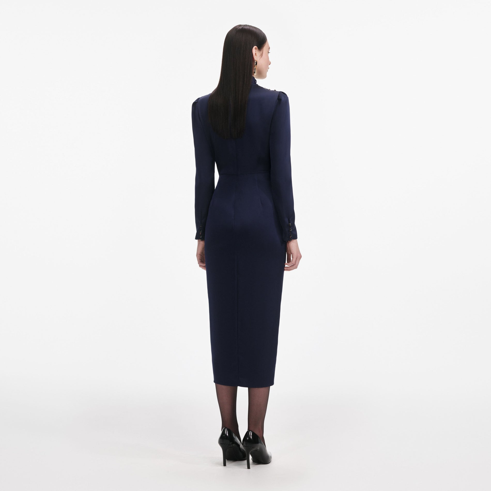 Back view of a woman wearing the Navy Satin Midi Dress