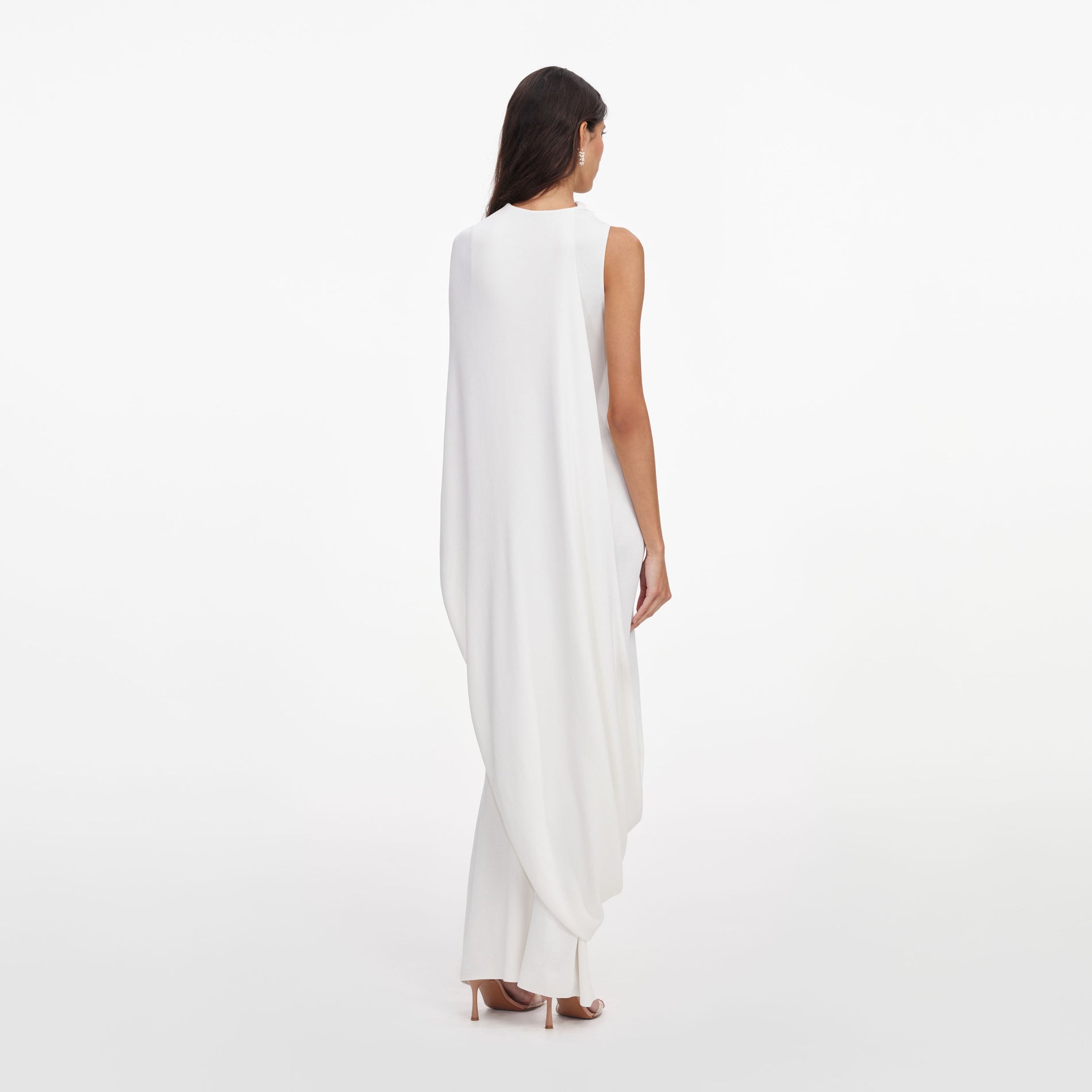 Back view of a woman wearing the White Viscose Knit Drape Maxi Dress