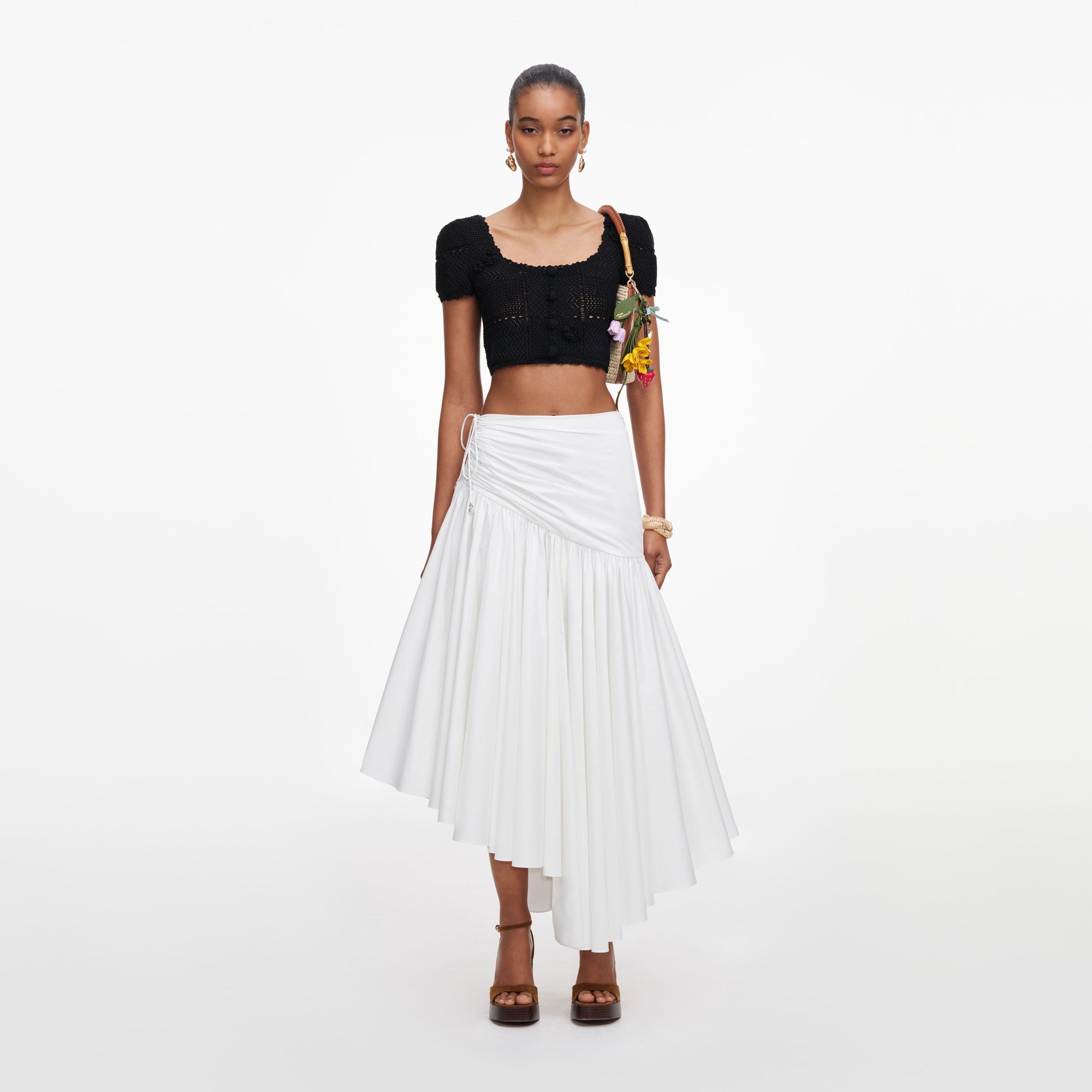 Front view of a woman wearing the Black Crochet Knit Crop Top