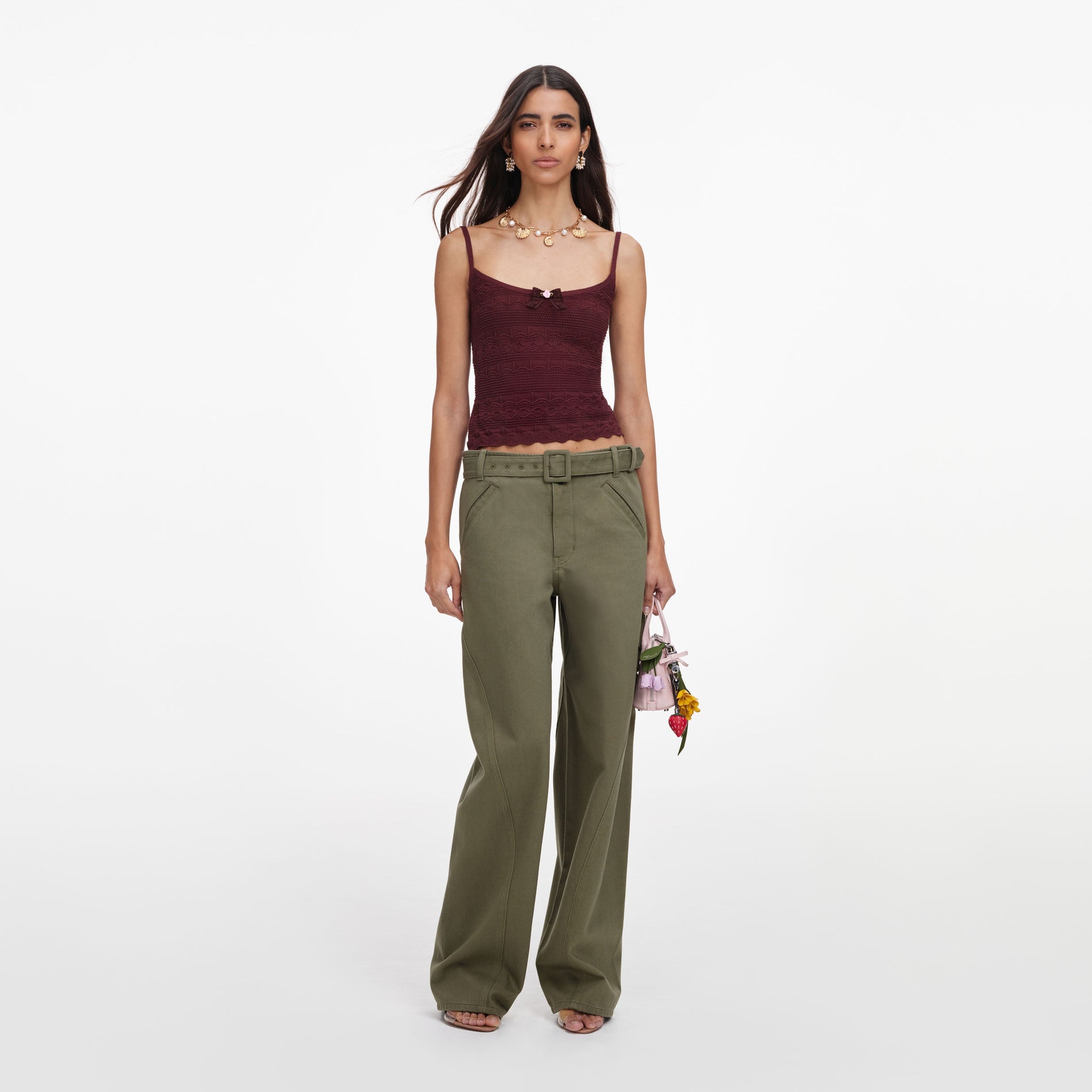 Front view of a woman wearing the Brown Pointelle Knit Vest