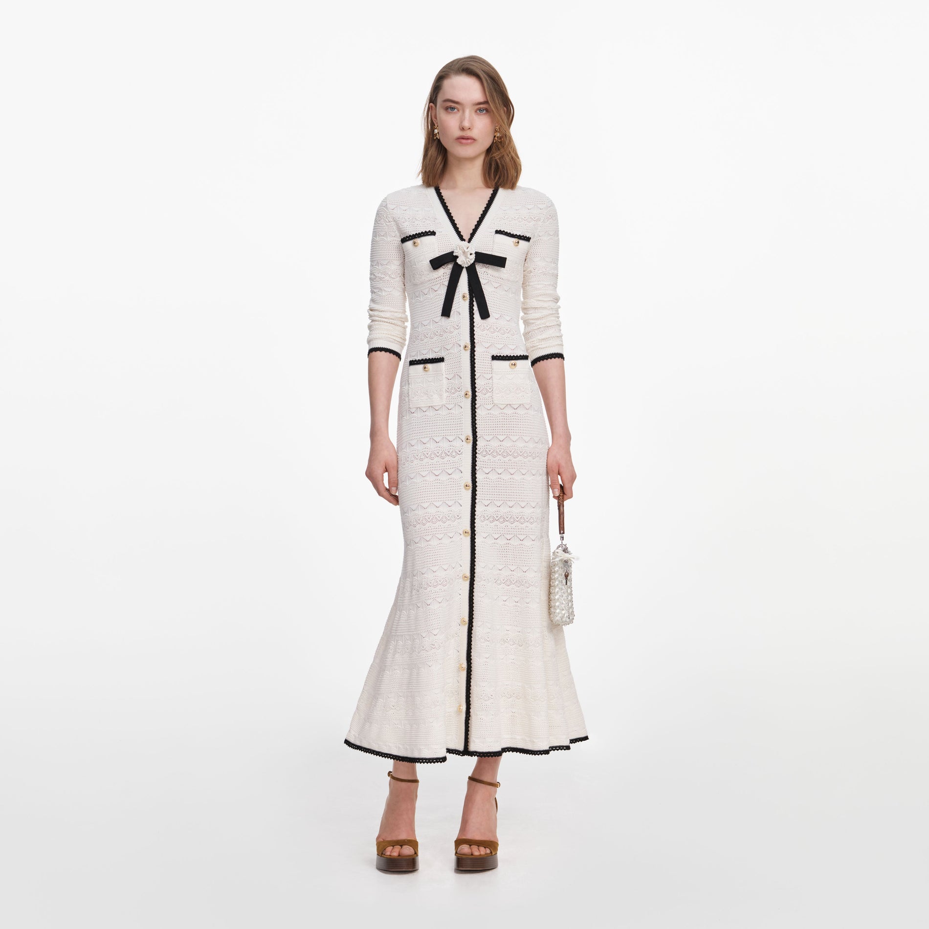 Front view of a woman wearing the White Pointelle Knit Long Cardigan