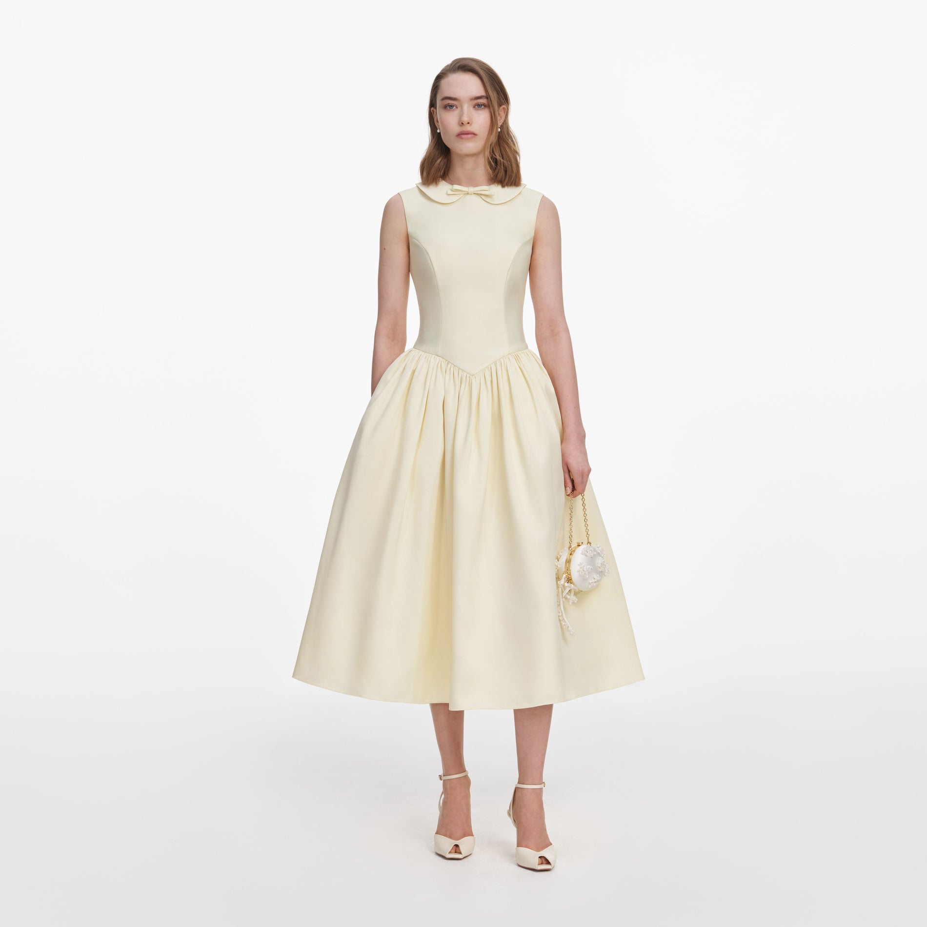 Front view of a woman wearing the Yellow Taffeta Collared Midi Dress