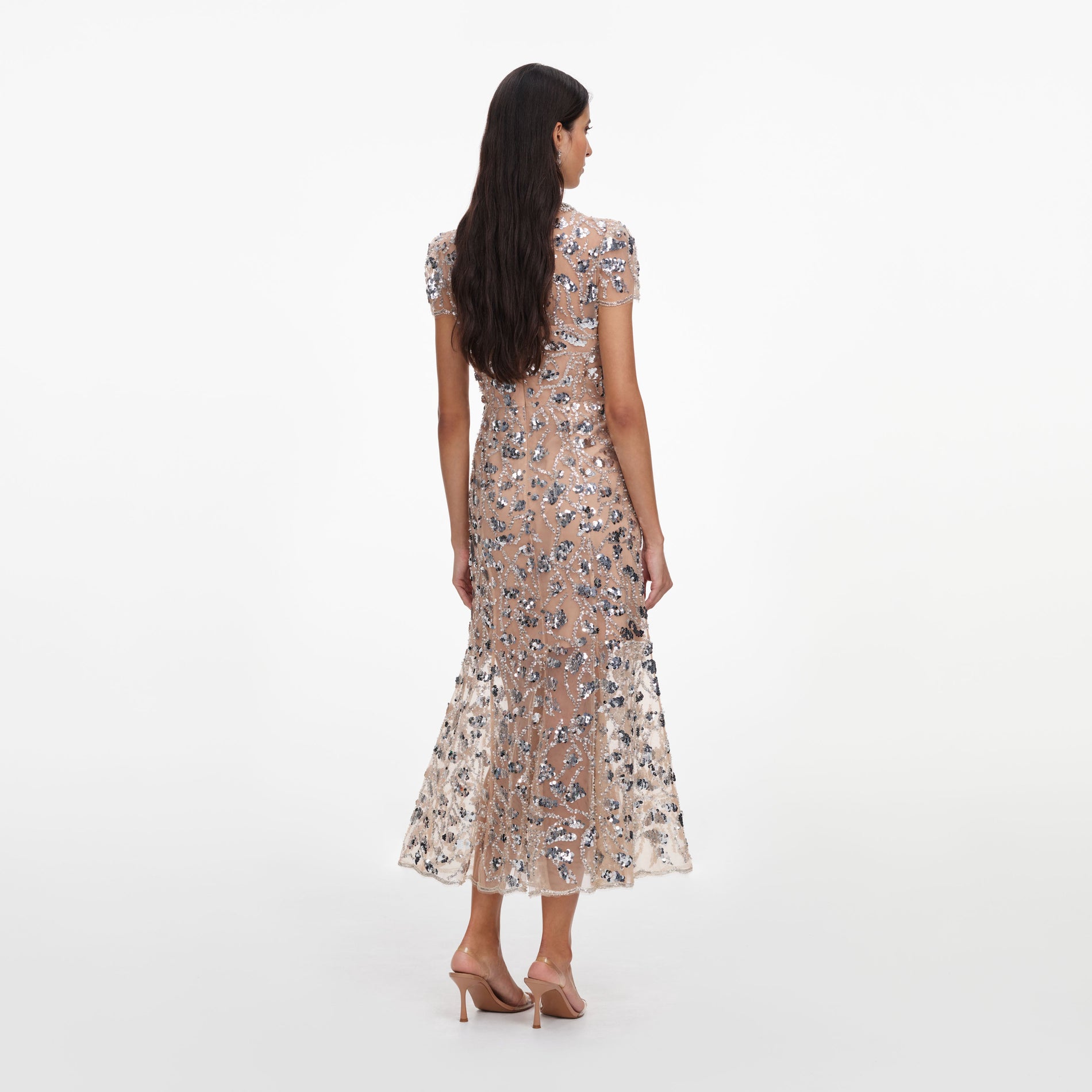 Back view of a woman wearing the Silver Sequin Embellished Midi Dress