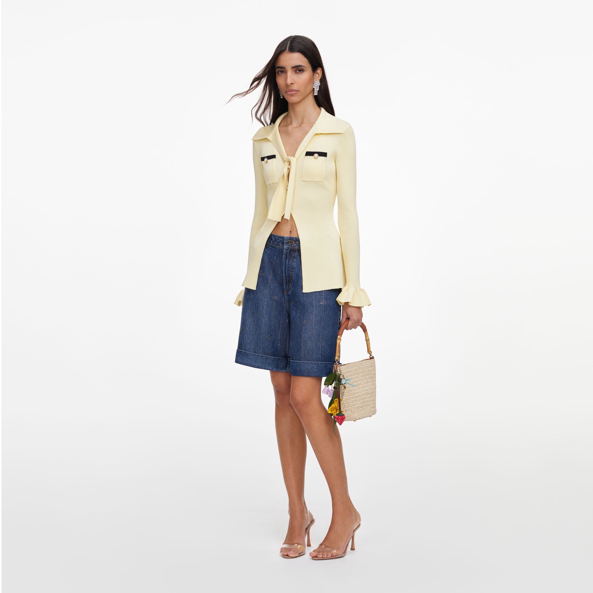 Side view of a woman wearing the Yellow Viscose Knit Tie Top