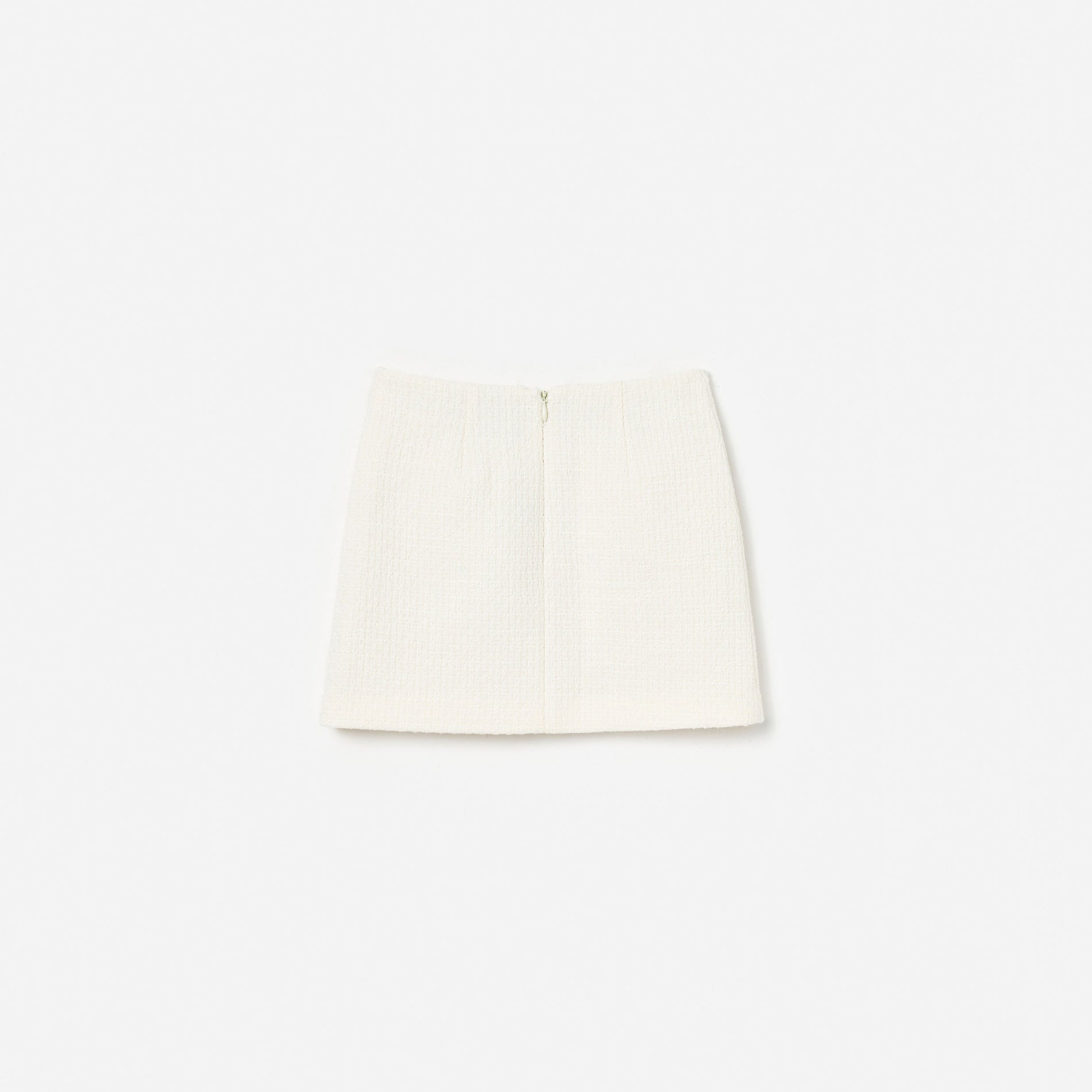 Cream tweed mini skirt with a back zipper