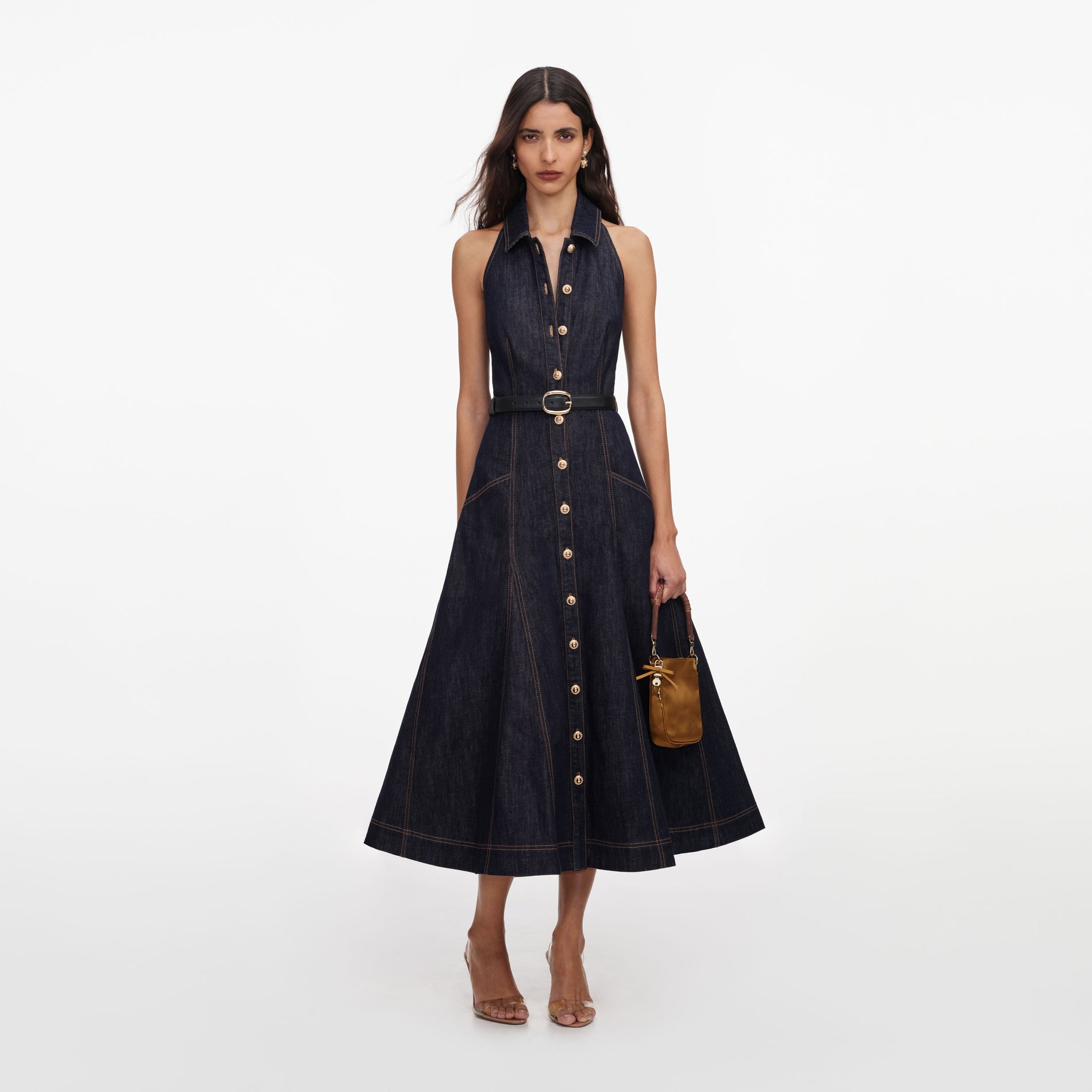 Front view of a woman wearing the Indigo Denim Halterneck Midi Dress