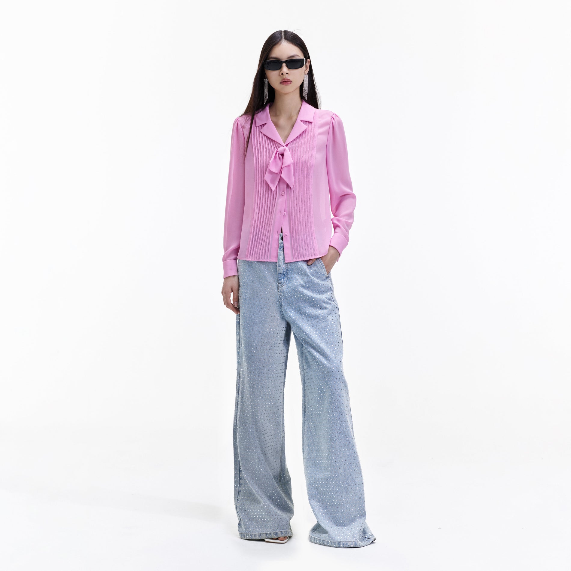 Front view of a woman wearing the Pink Chiffon Blouse