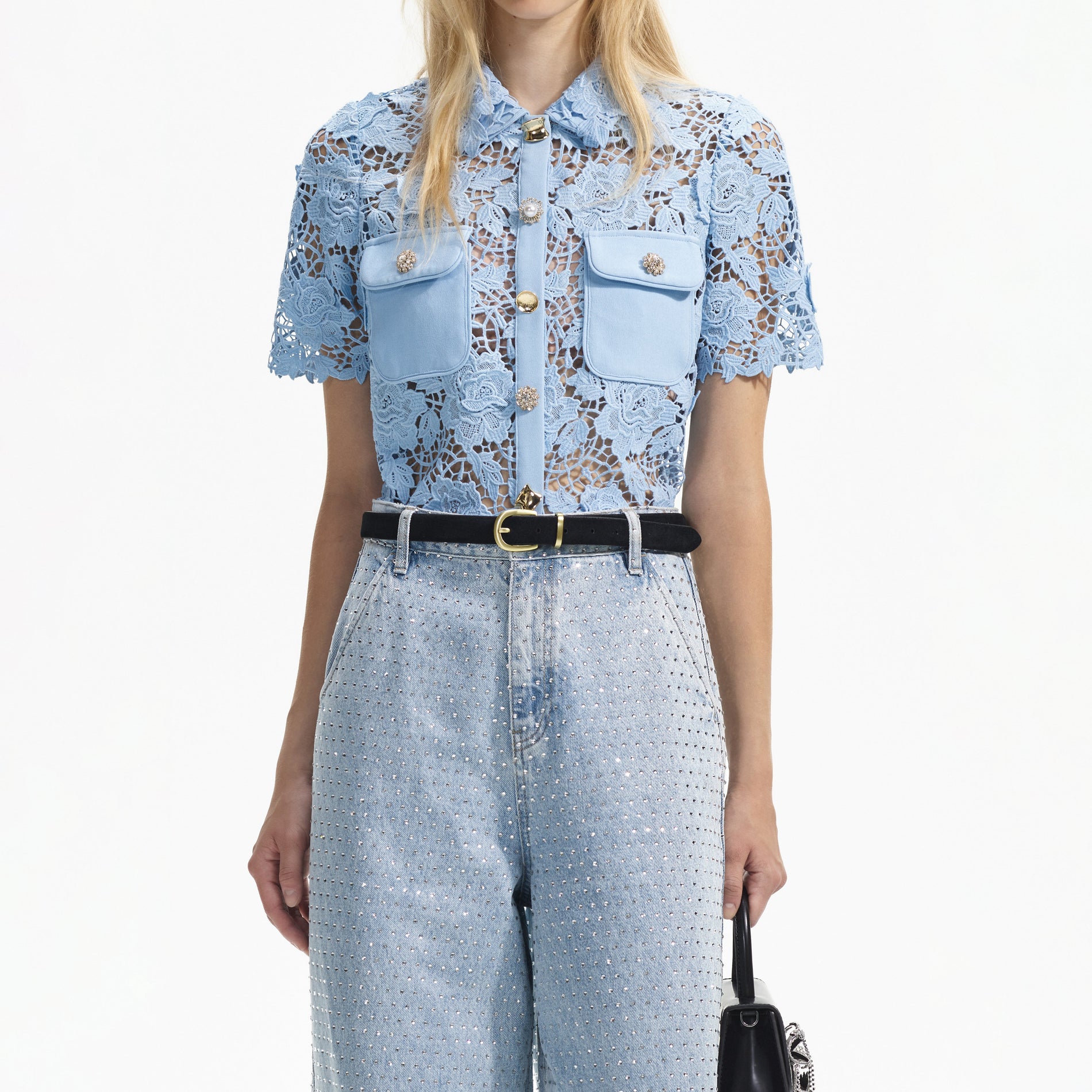 A close up of a woman wearing the Blue Lace Collar Top