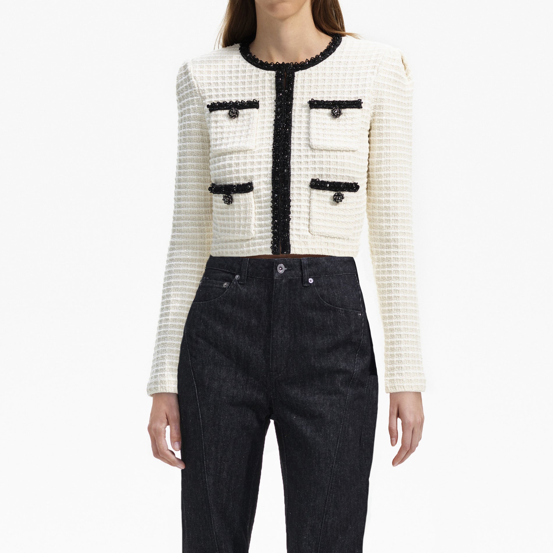 Back view of a woman wearing the Cream Textured Knit Cardigan